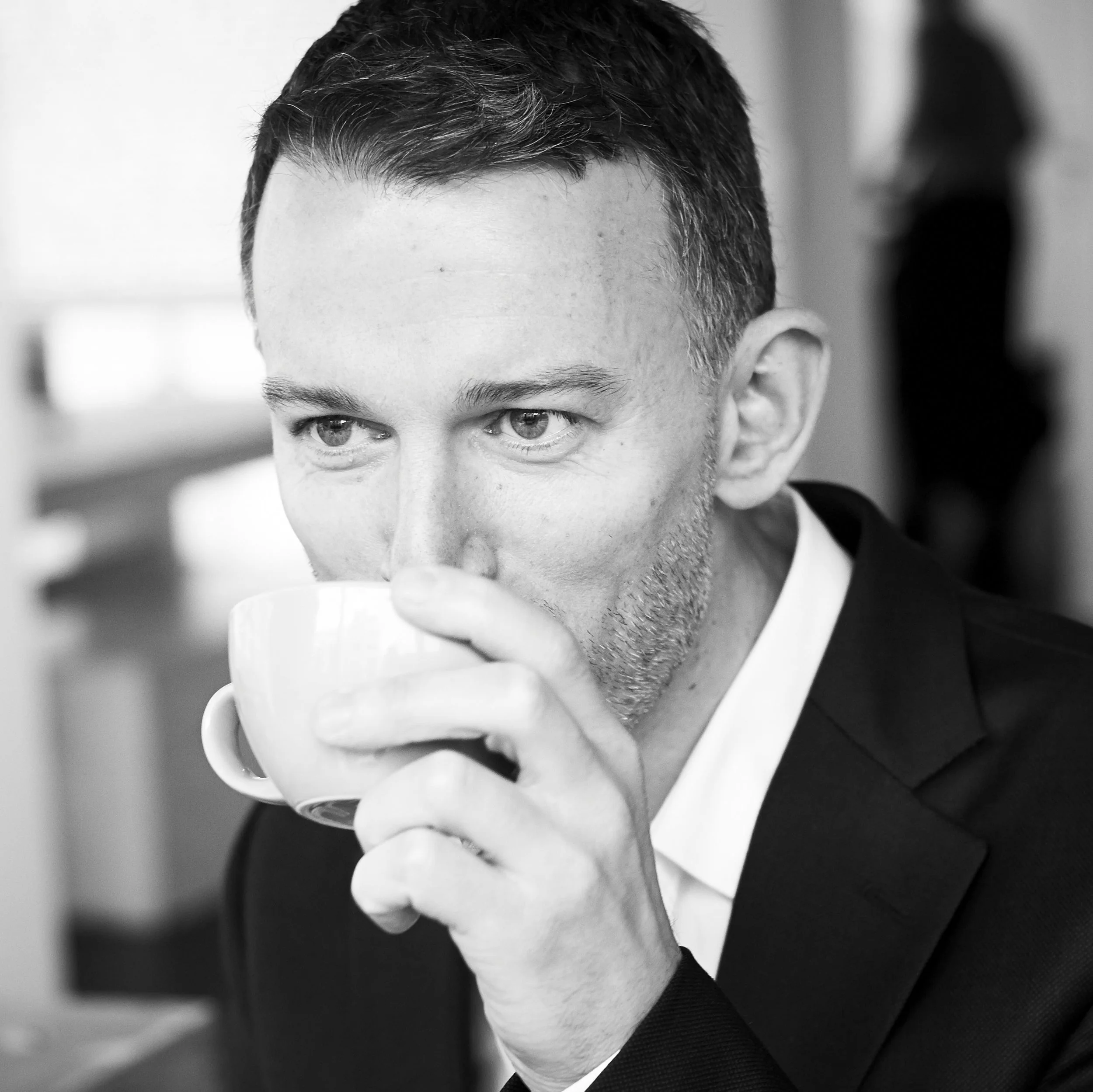 David Collins drinking coffee