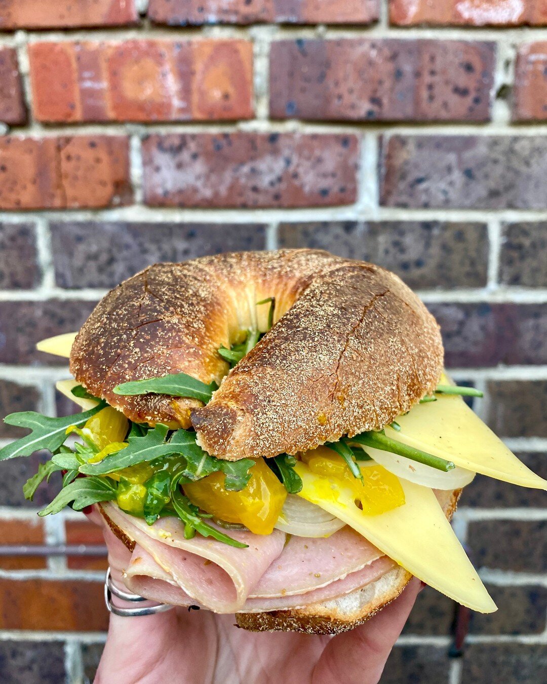 🚨 There&rsquo;s a new kid on the block!! 🚨​​​​​​​​
​​​​​​​​
A sourdough bague filled with mortadella, Swiss cheese, sweet mustard pickles, pickled onion and rocket ~ you&rsquo;re welcome! 🤤🤤​​​​​​​​
​​​​​​​​
​​​​​​​​
#bague #bagel #betterbread #b