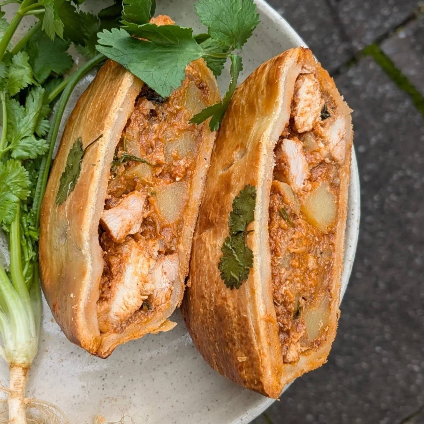 New!
Butter chicken pie 🎉
Couldn't  possibly pick a better day to have a crack at the new pie gracing our hotbox. 
Miserable weather and tummy warming food make for great companions
