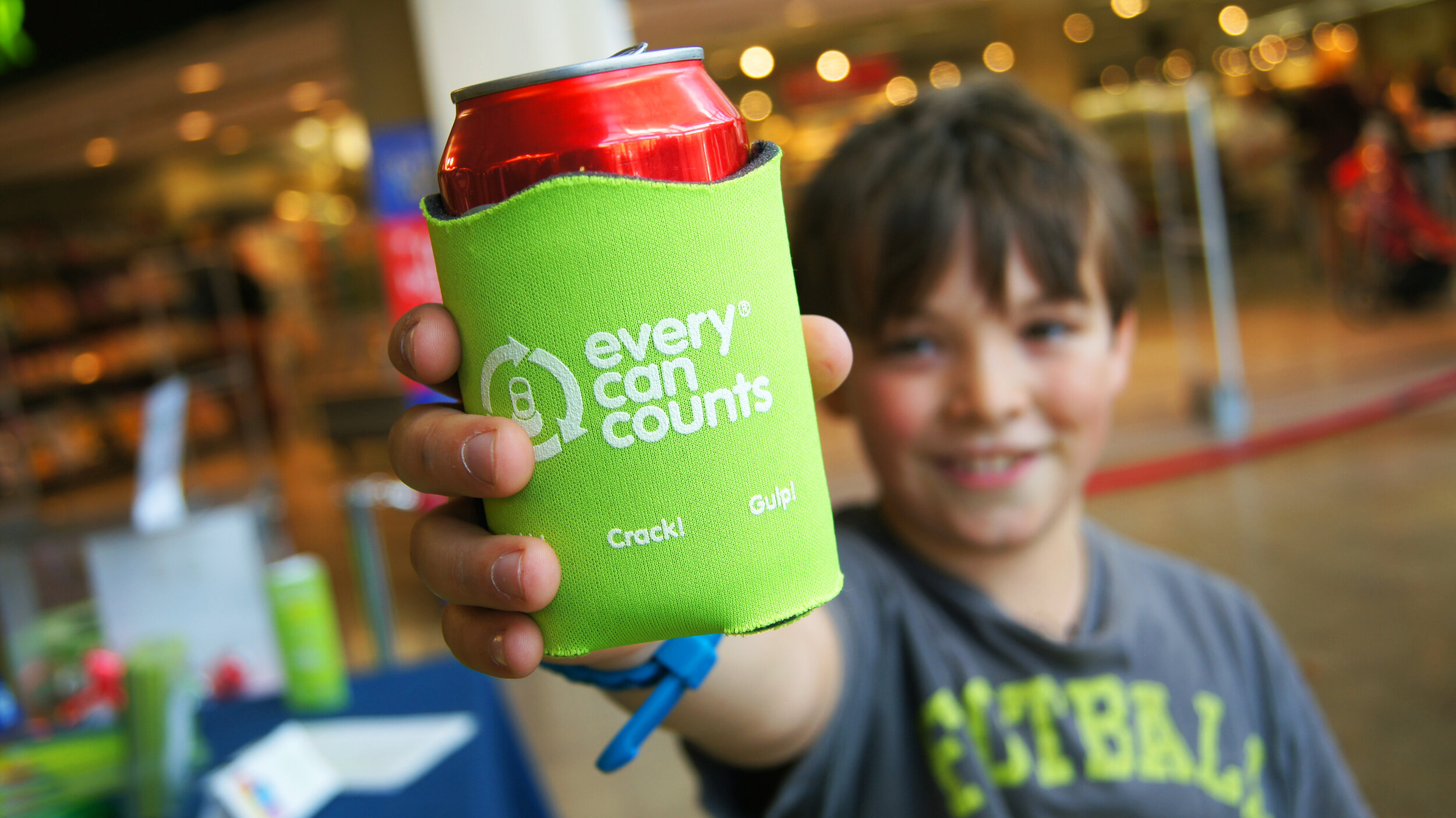 ECC - Boy holding ECC can.JPG