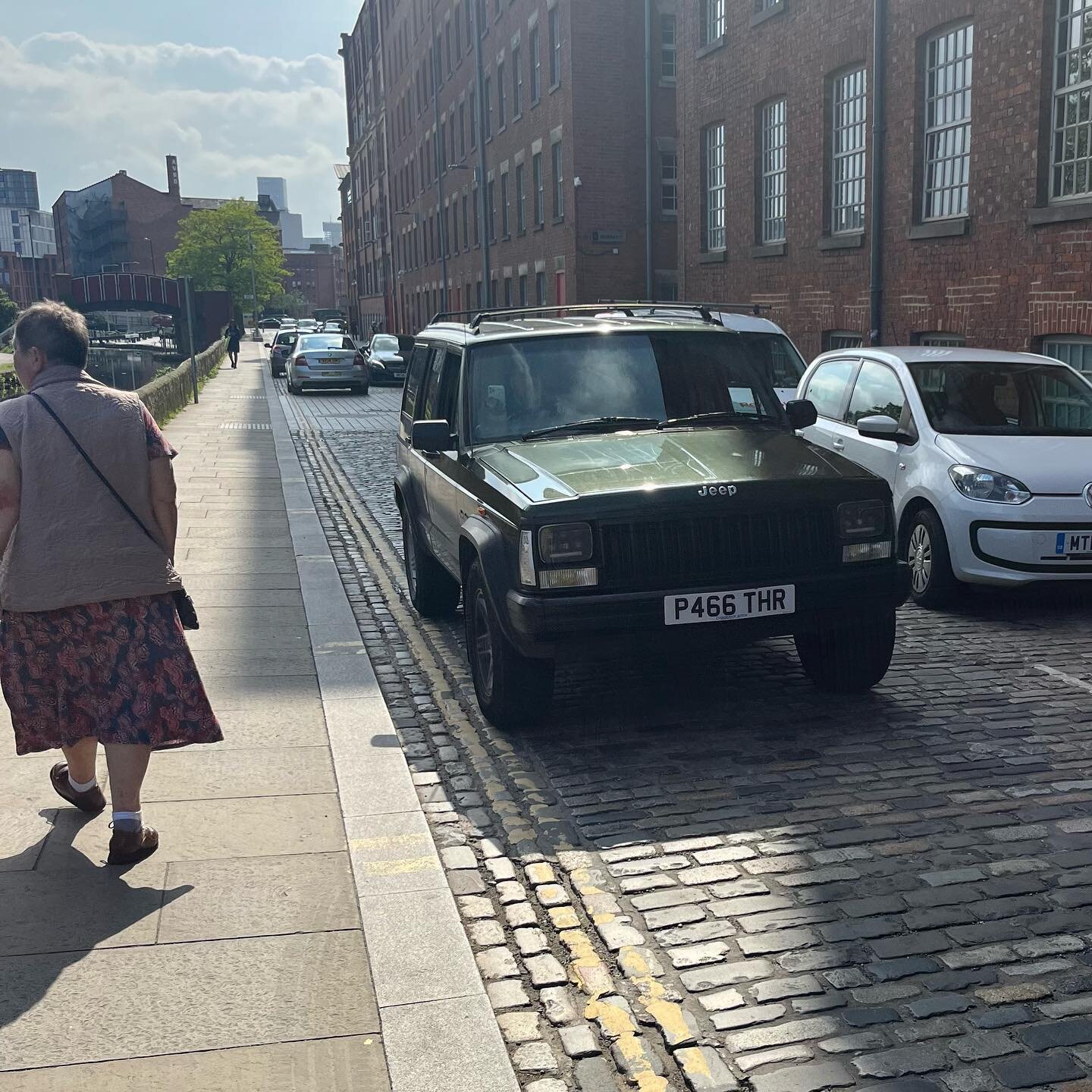 The lady looks away unimpressed as a big green block on wheels rumbles past&hellip;