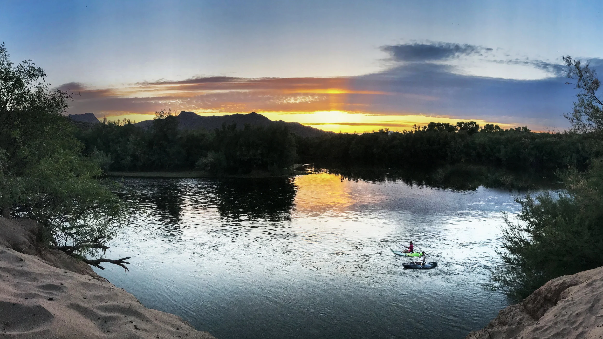 Mesmerizing Sunset On The Salt River Of The Tonto Nartional Forest In Arizona USA With Kayakers In The Foreground copy.jpg