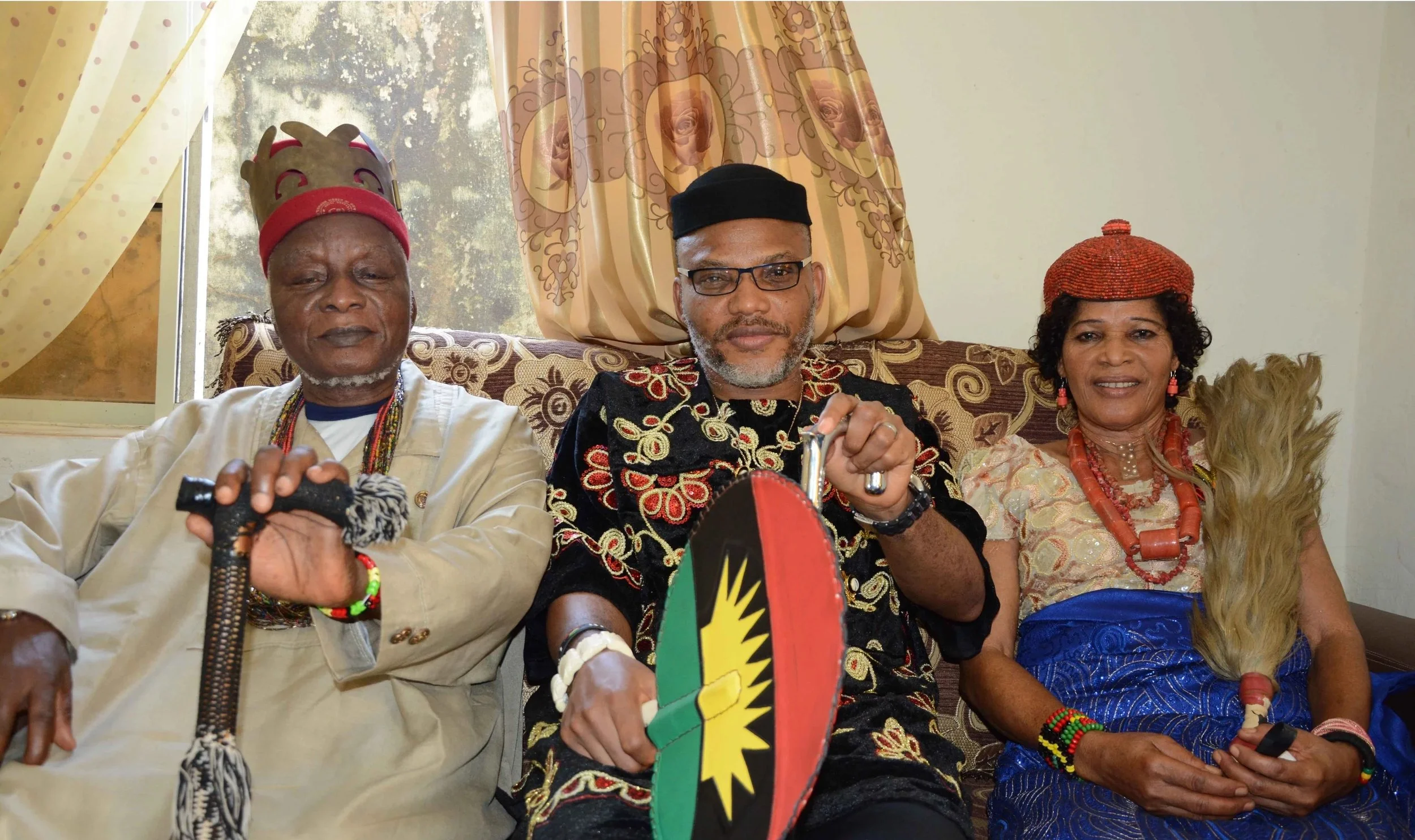 Kanu with Parents.jpg