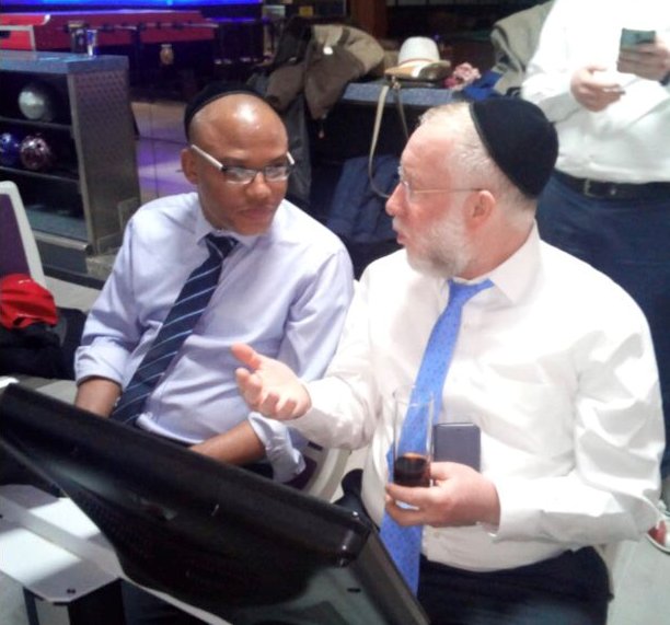 Kanu speaking with Chief Rabbi of Munich Shmuel Brodman