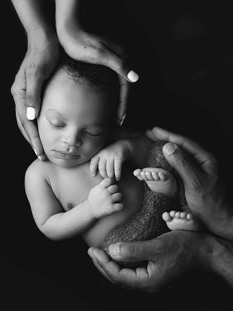 in-mom-and-dads-hands-bw.jpg