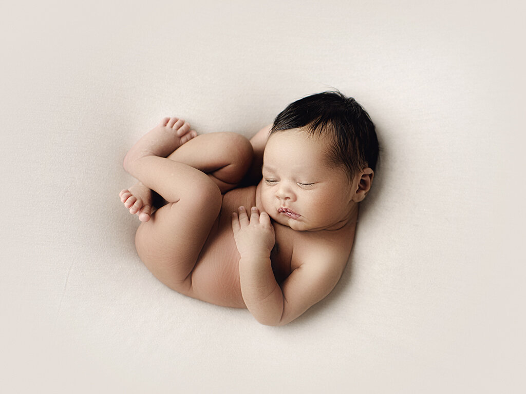 newborn posing.jpg