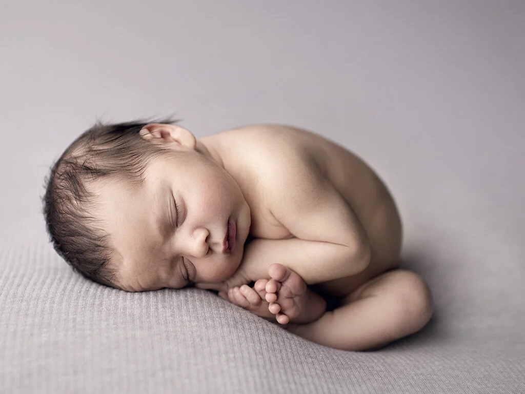 newborn taco pose.jpg