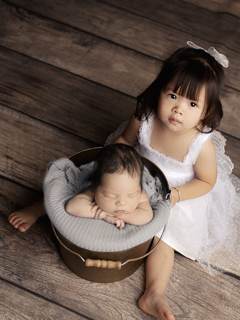 newborn and sibling portraits.jpg