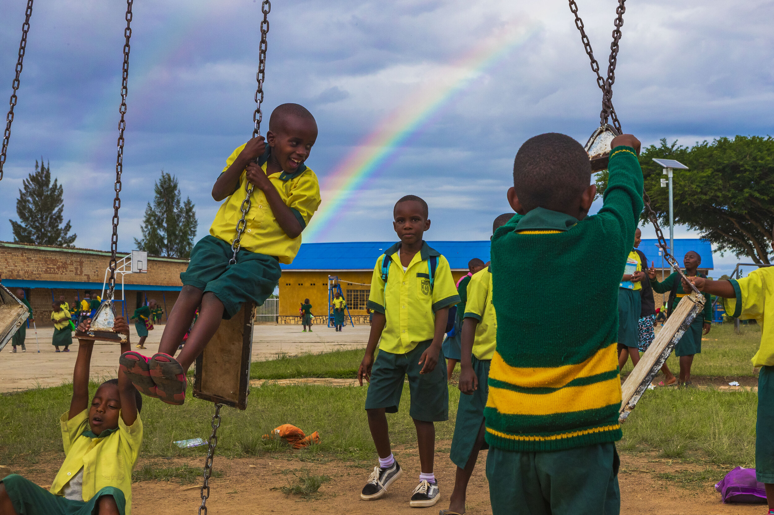  School children play on a broken swing set after a storm at HVP Gatagara-Nyanza on Monday May 20, 2019 in Southern Province, Rwanda. HVP Gatagara-Nyanza is one of the few government funded schools in Rwanda that integrates those with physical/mental