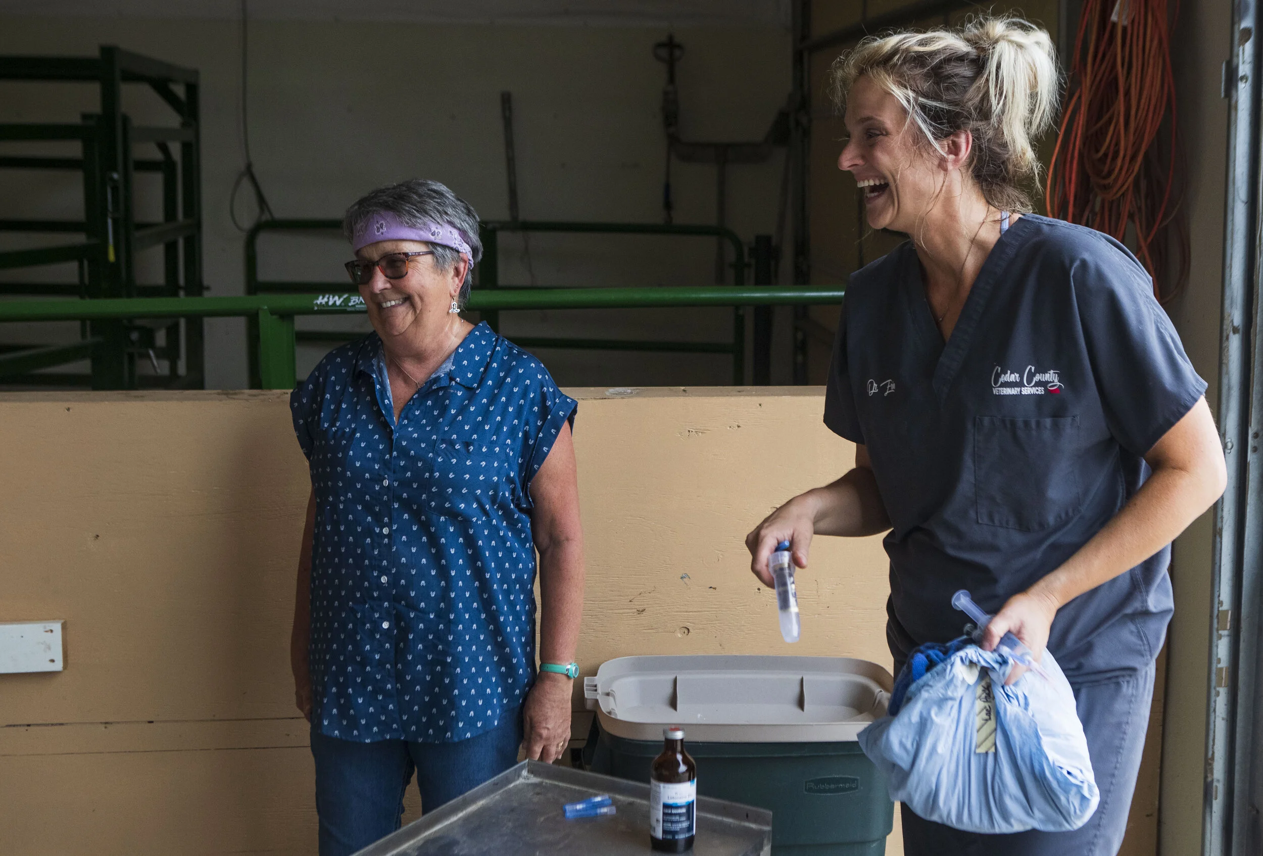  Dr. Erin Schroder shares a laugh Kathy Halworth after caring for her horse at Cedar County Veterinary Services on Monday, Jun. 10, 2019, in Hartington, Nebraska. 