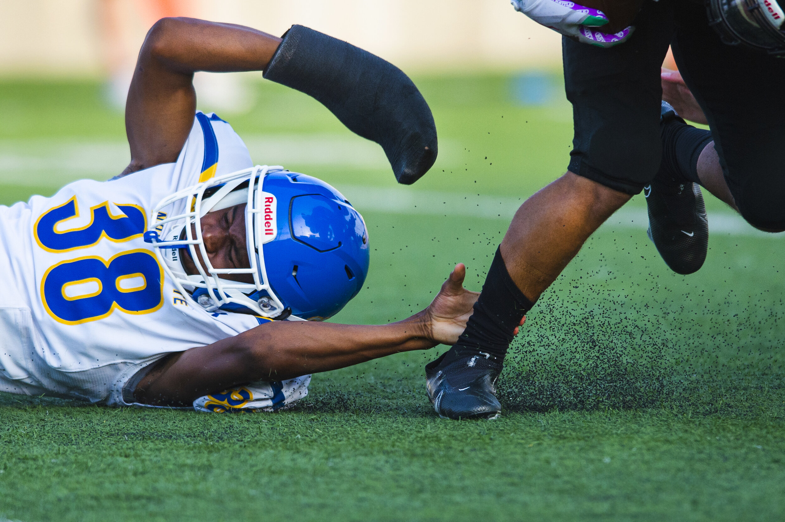  North Platte's Kymani Sterling (38) loses his grip on Lincoln Northeast ball carrier Xavier Gary (4) as he attempts to return a punt in the third quarter at Seacrest Field on Friday, September 25, 2020, in Lincoln, Nebraska. KENNETH FERRIERA, Journa