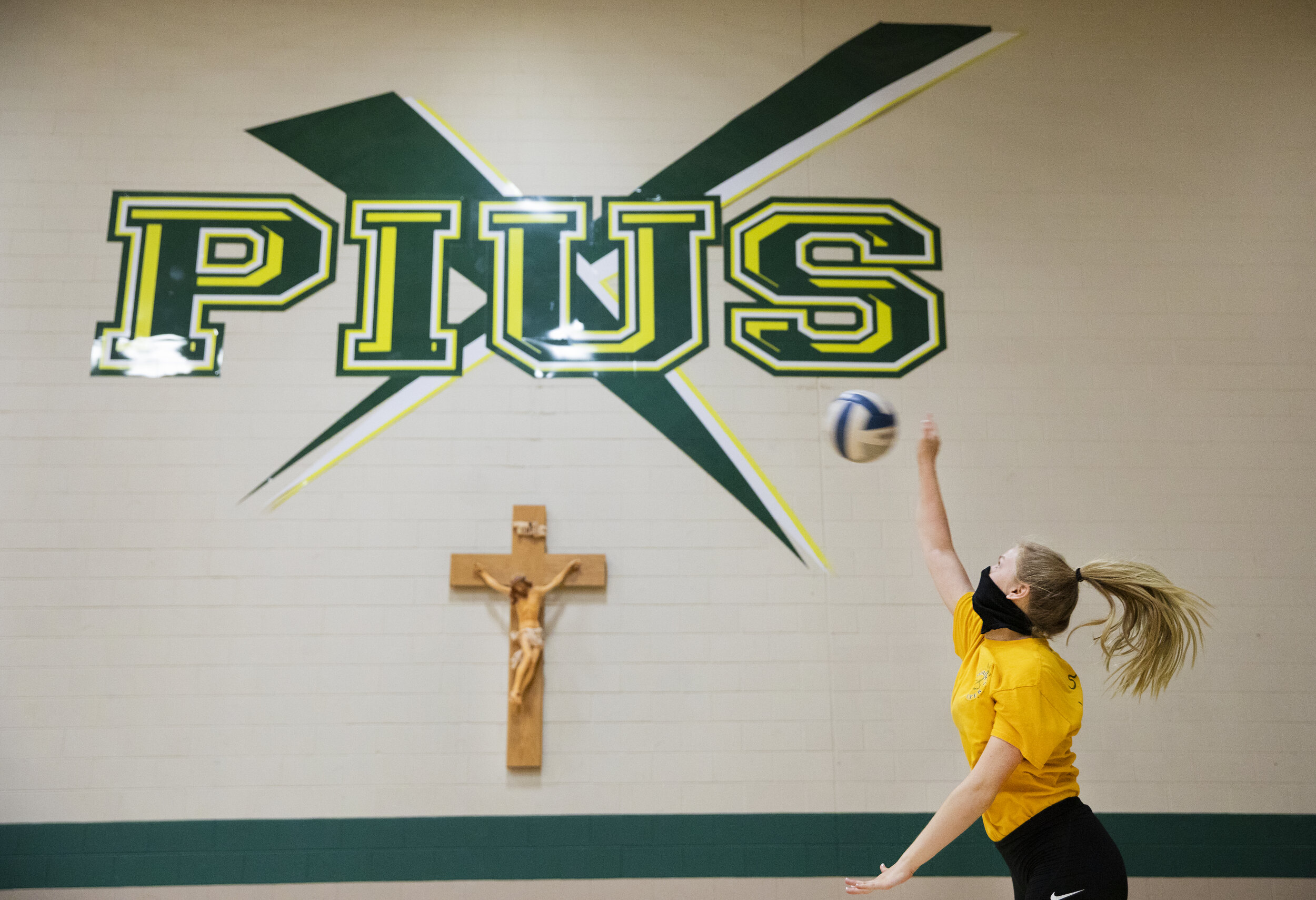  Leah Mach serves the ball over the net during the first day of Fall practice for Lincoln Pius X volleyball on Monday, August 10, 2020. KENNETH FERRIERA, Journal Star.  