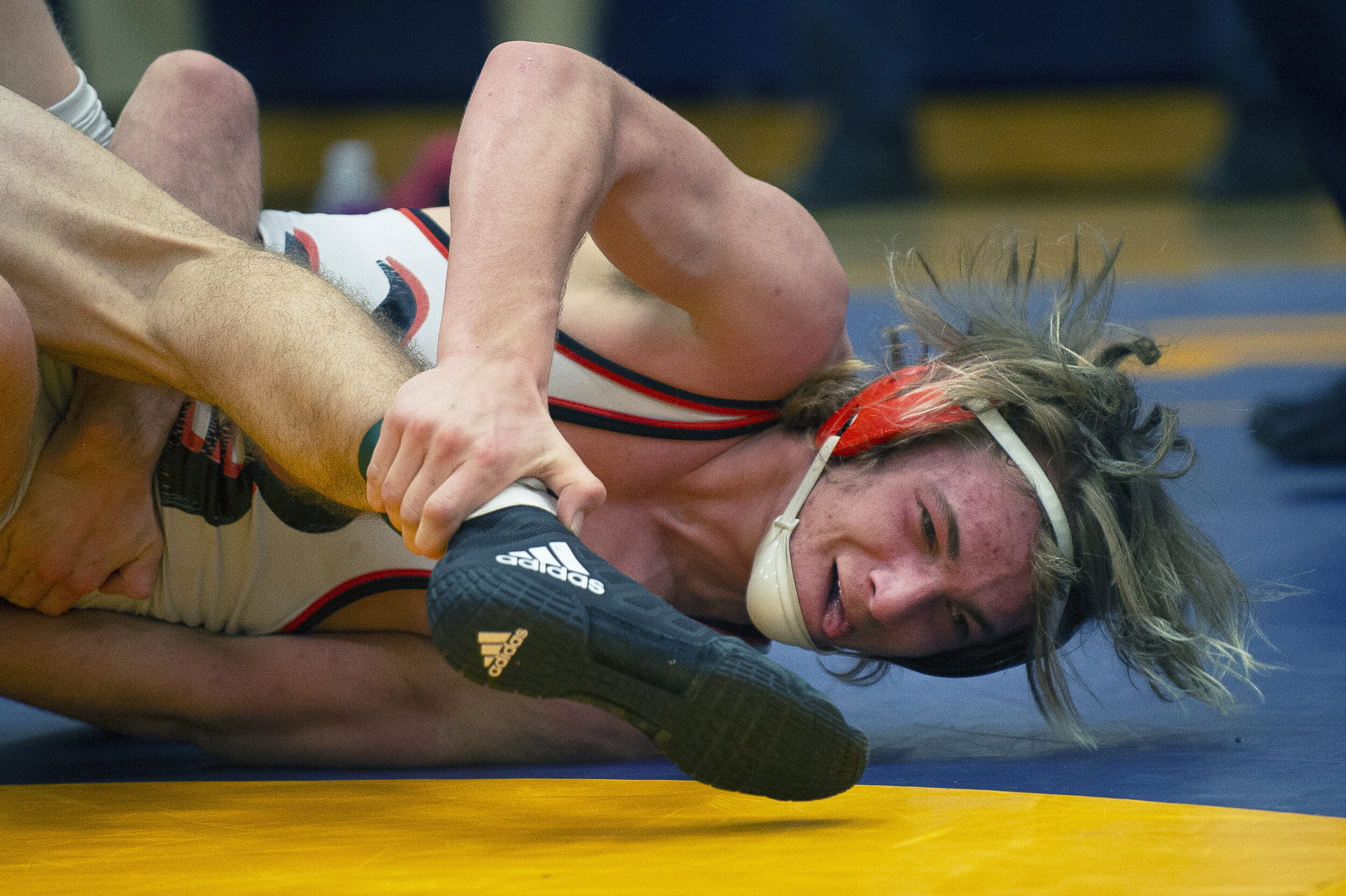 Beatrice's Jarrett Koch reacts as he is twisted into an uncomfortable position by Malcolm's Gavin Zoucha during the Raymond Central Invitational on Saturday, January 30, 2021, at Raymond Central High School. KENNETH FERRIERA, Journal Star. 