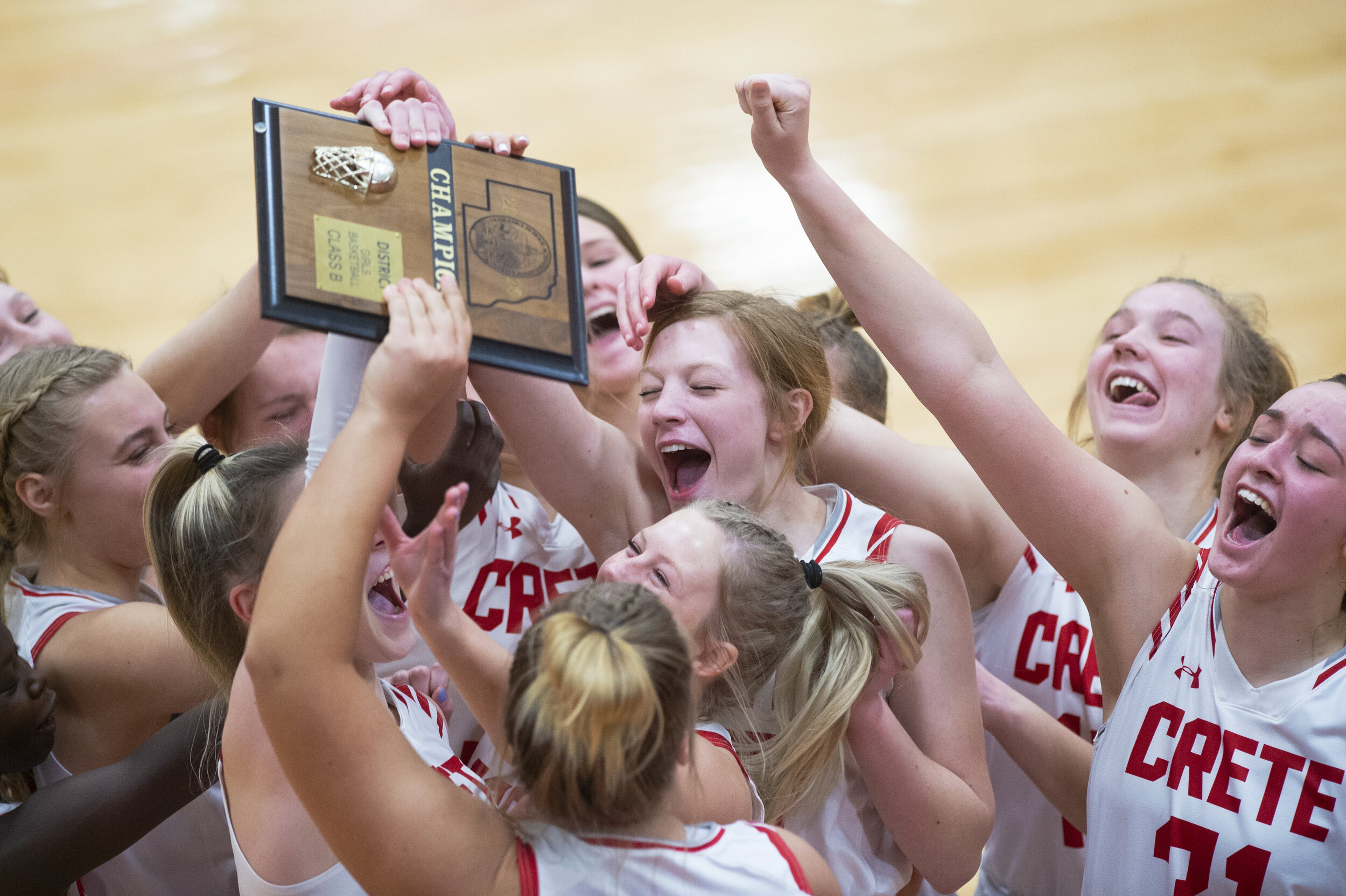  Crete celebrates after defeating Waverly 40-31, to win the  B-3 district final to secure their spot in the state championship tournament on Saturday, February 20, 2021, at Crete High School. KENNETH FERRIERA, Journal Star. 