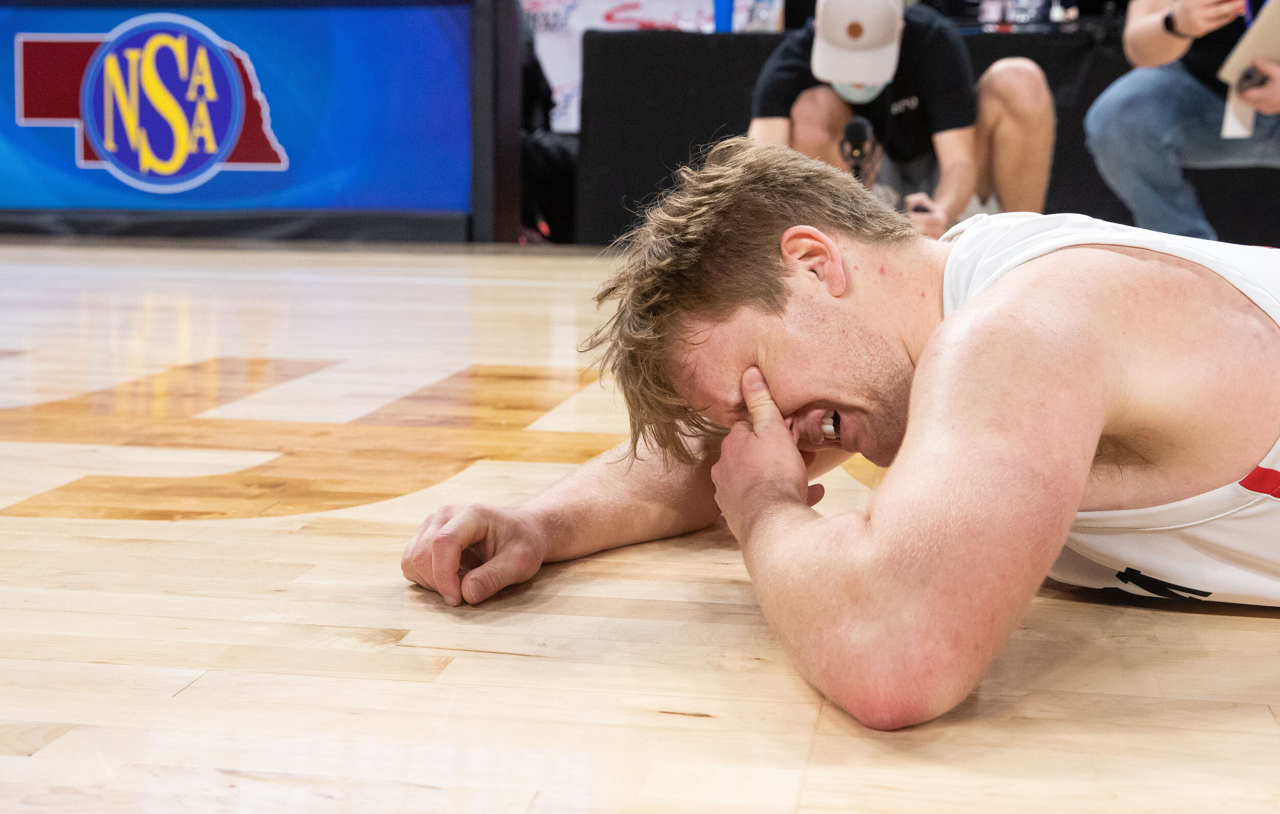  Auburn's Cameron Binder collapses in tears after defeating Adams Central to secure the C-1 state championship, Saturday, March 13, 2021, at Pinnacle Bank Arena. KENNETH FERRIERA, Journal Star 