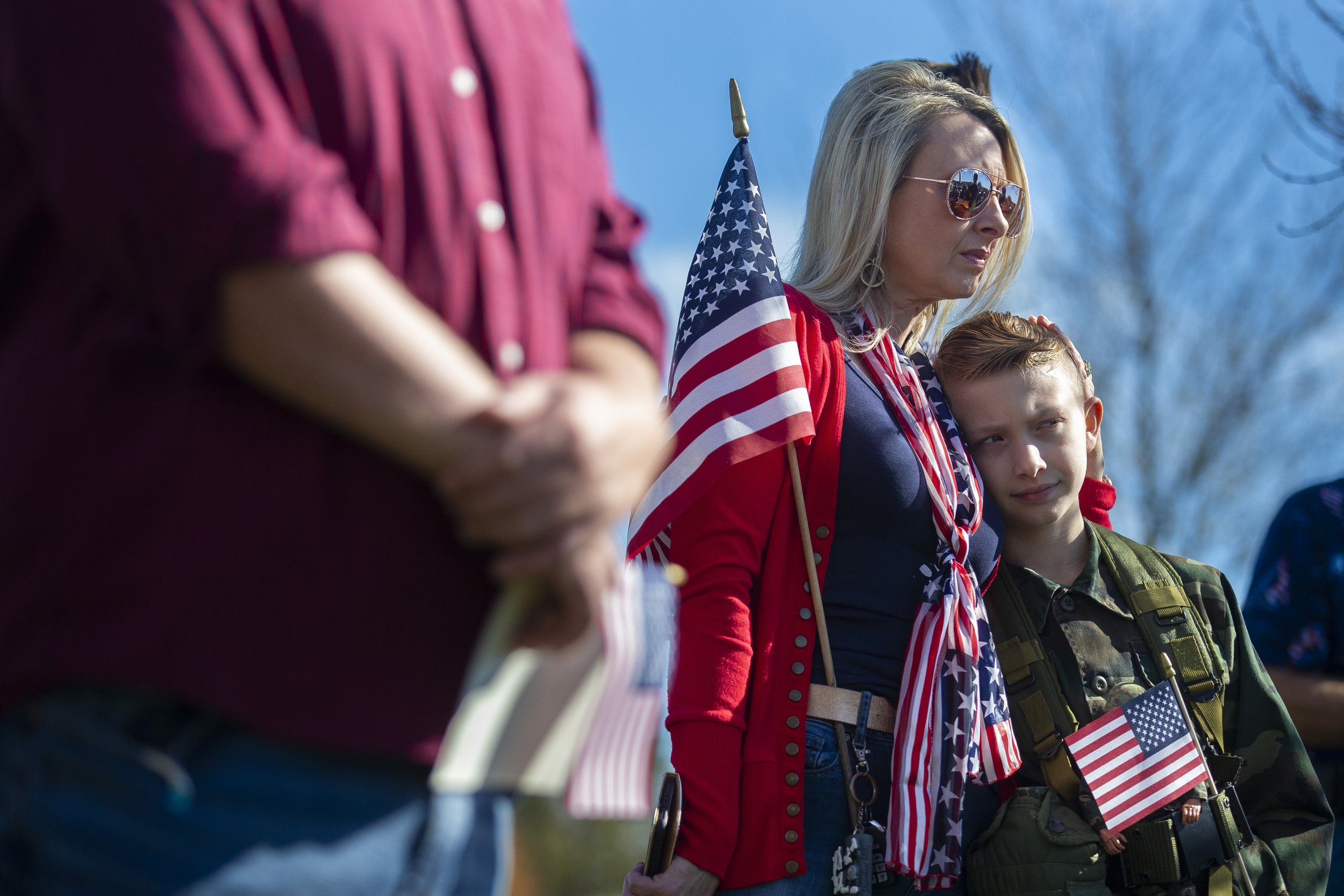  Elizabeth Barker comforts her son Linus Barker as the story of J.T. Doss is retold  during the annual Veterans Day ceremony at Triad Park in Kernersville, N.C., on Thursday,November 11, 2021.    "His heart has been hurting a lot today, he's been thi