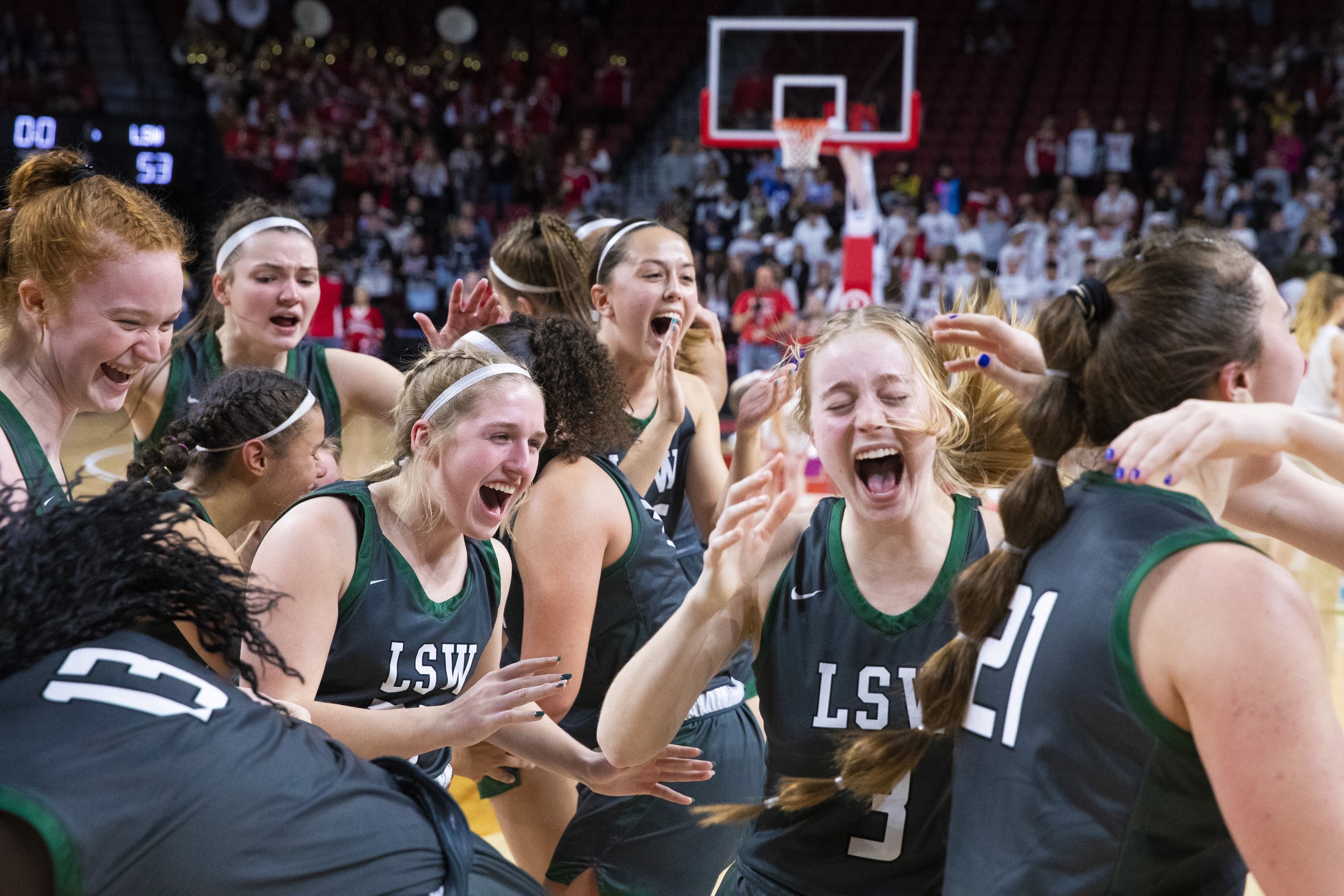  Lincoln Southwest celebrates on the court after defeating No.1 ranked Millard South during a Class A girls semifinal game at Pinnacle Bank Arena on March 9, 2022, in Lincoln, Nebraska. 