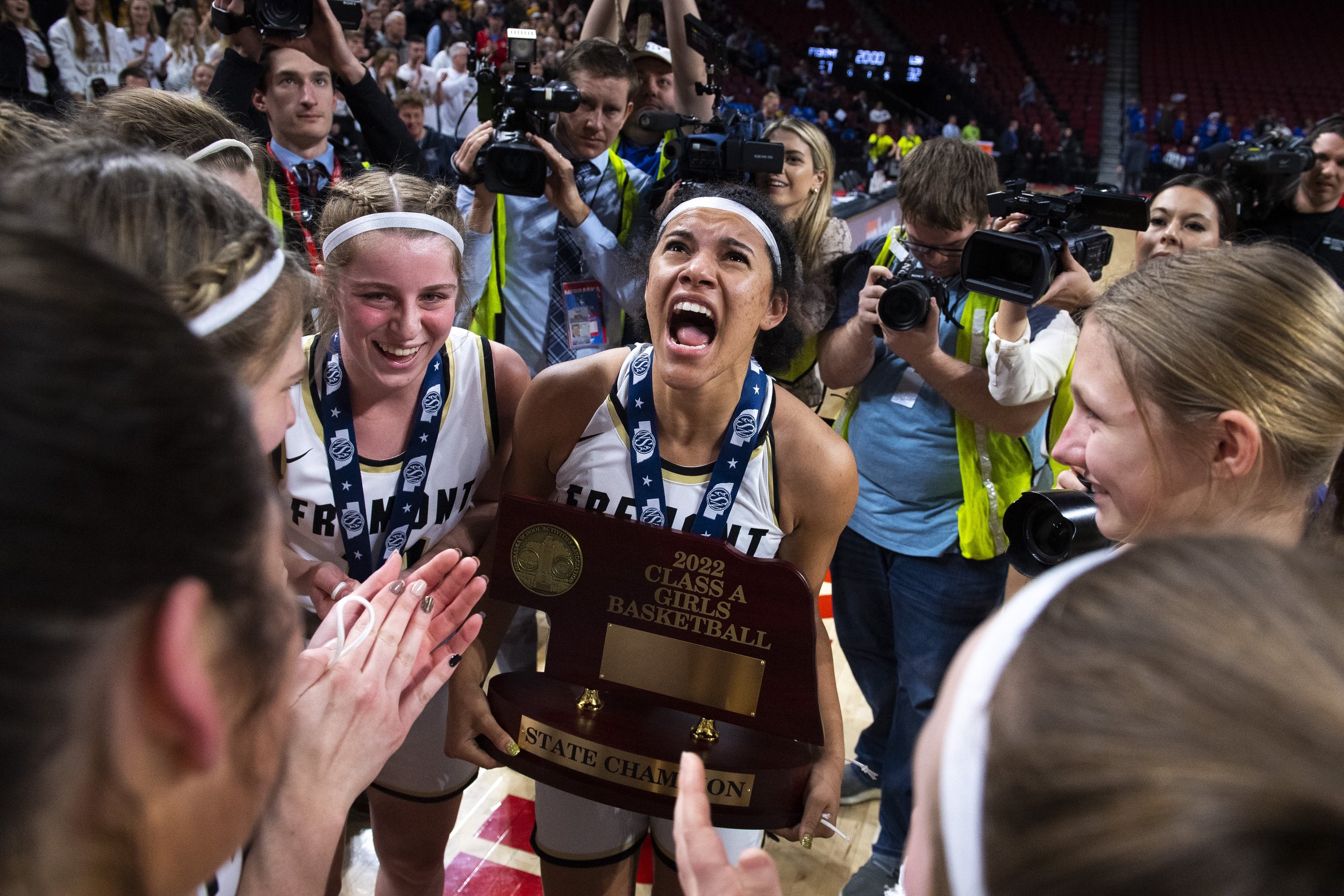  Fremont's Macy Bryant (center) celebrates with her teammate during the Class A girls championship at Pinnacle Bank Arena on March 11, 2022, in Lincoln, Nebraska As her teammates gather around her, Macy Bryant only has one thing on her mind. "This is