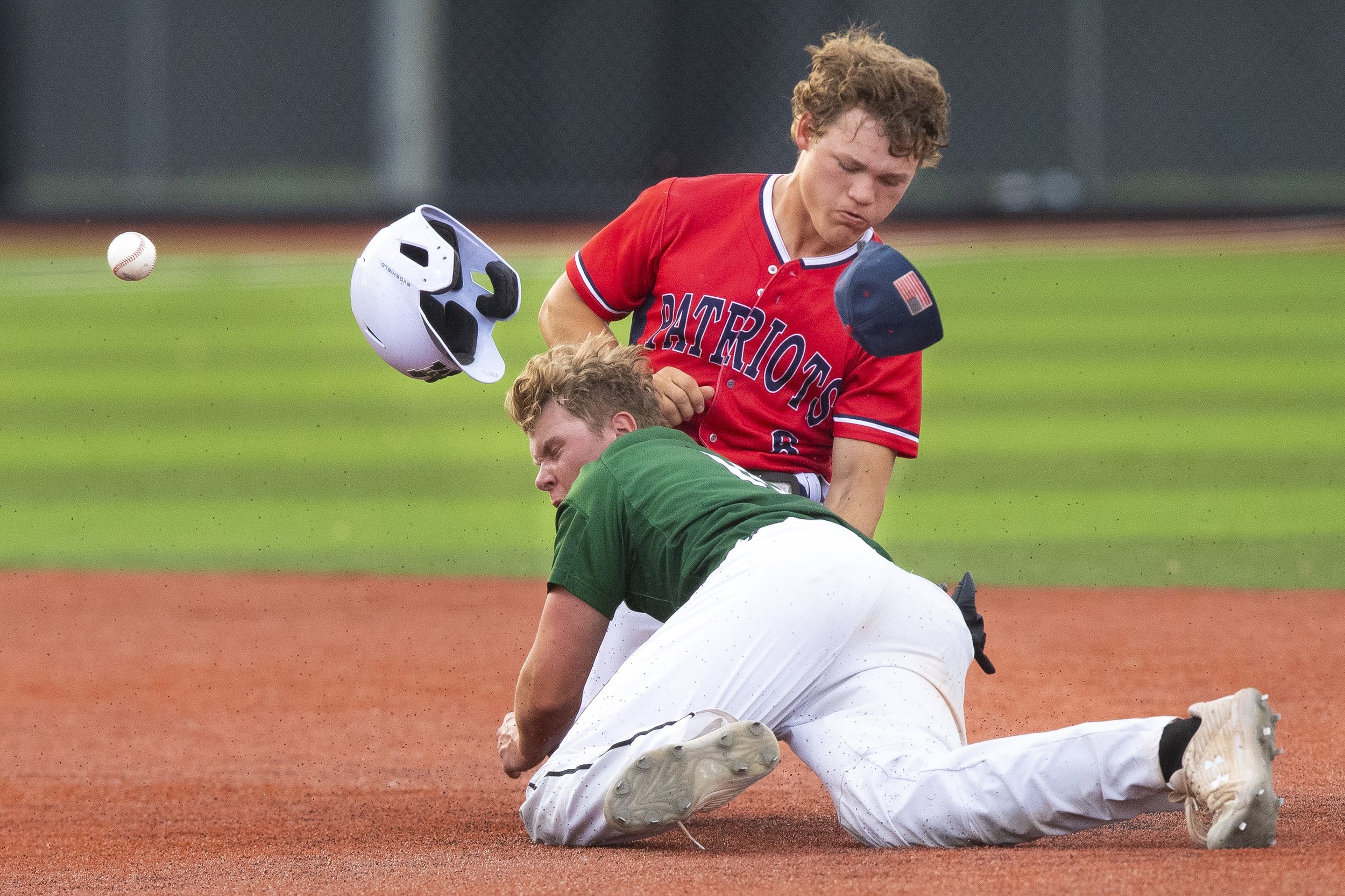  Millard West's Dylan Driessen collides into Millard South's Camden Kozeal while stealing second base in the first inning during the Class A championship at Tal Anderson Field on May 19, 2022, in Omaha , Nebraska. 