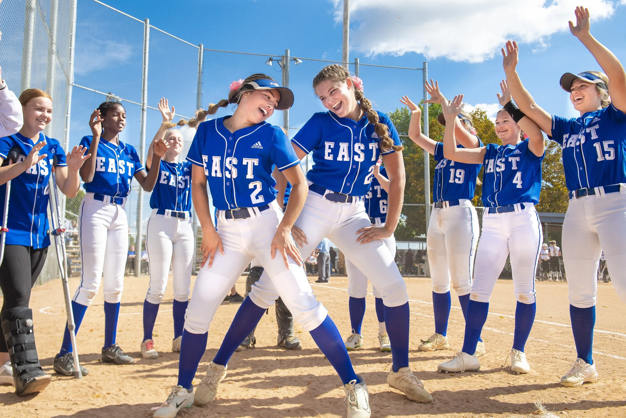  Lincoln East's Gabby Pace (center left) and Kooper Barnes (center right) show off their dance moves during a pregame huddle before taking on Fremont, on Wednesday, Oct. 5, 2022, at Doris Bair Complex in Lincoln. 