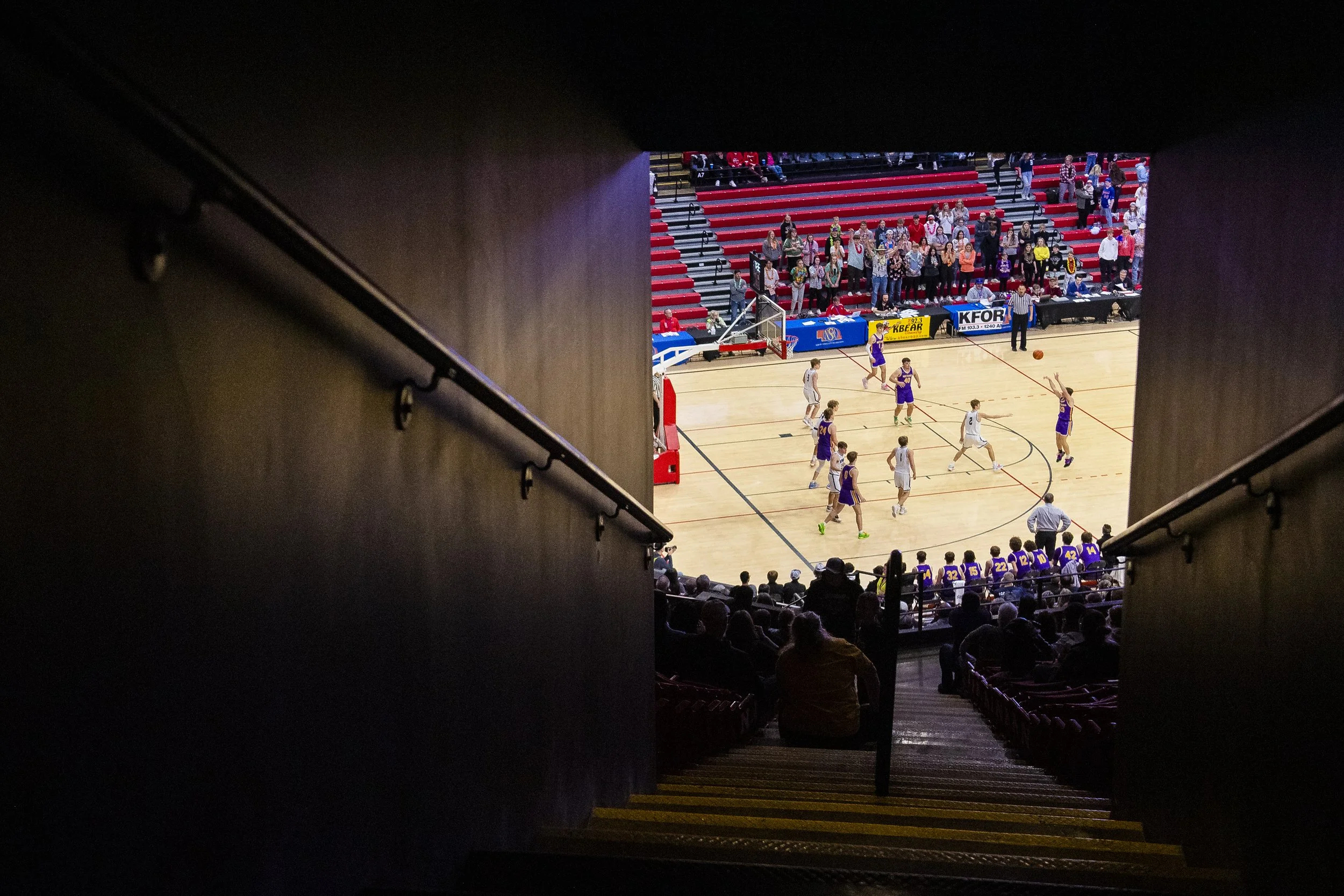  SEM's Colt Schroeder (right) attempts to score three-points over Wynot's Dylan Heine (first right) in the second half during a Class D-2 state semifinal tournament game Friday, March 10, 2023, at the Devaney Sports Center. 