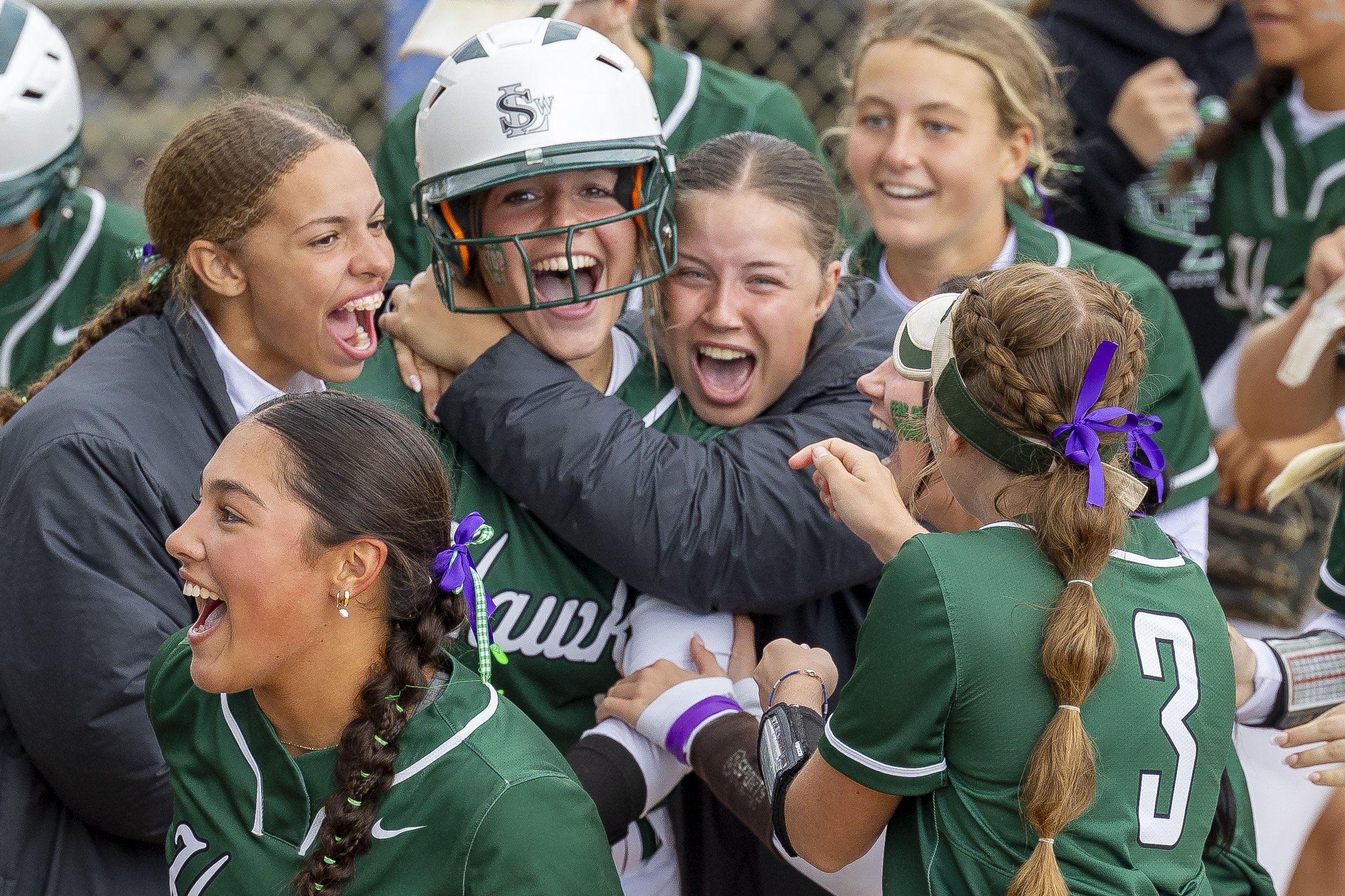  Lincoln Southwest's Hadley Madson (first left) celebrates with her teammatres after hitting a two run homerun in the sixth inning against Lincoln Eastat Bill Smith Softball Complex, on Wednesday, Oct. 11, 2023, in Hastings. 
