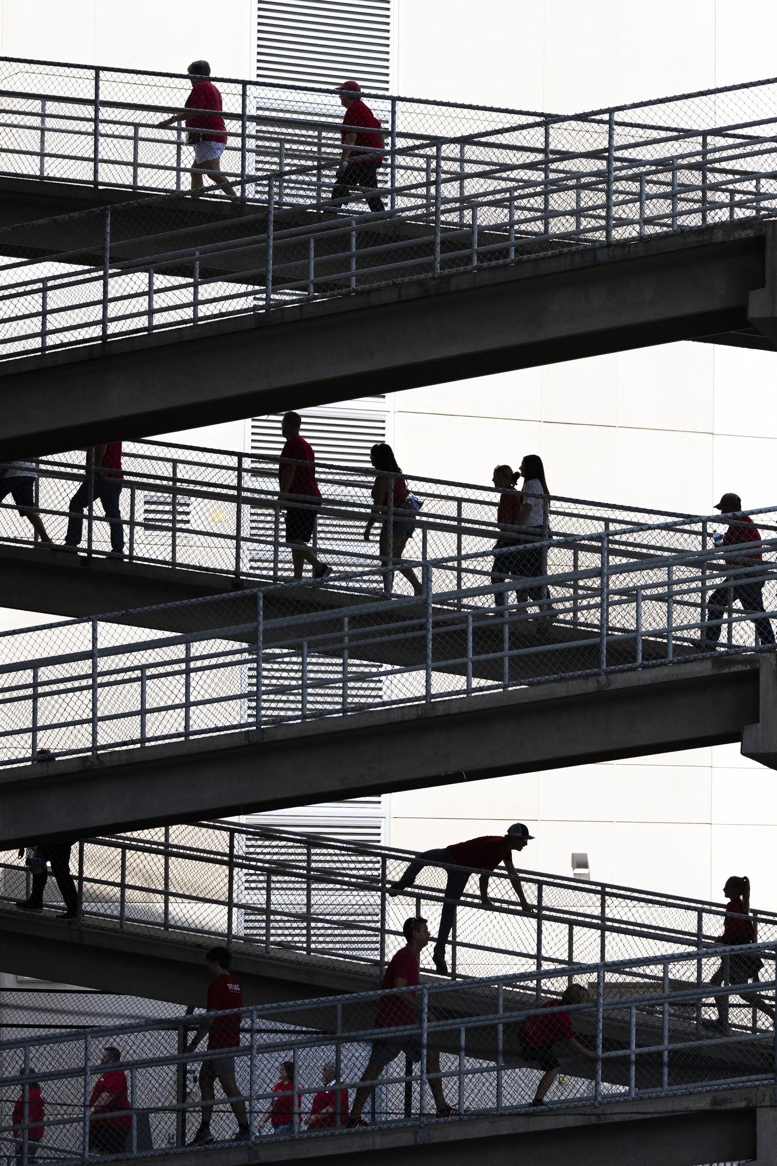  Volleyball fans walk the southeast ramps to their seats on the upper levels of Memorial Stadium ahead of Volleyball Day, on Wednesday, Aug. 30, 2023, in Lincoln. 