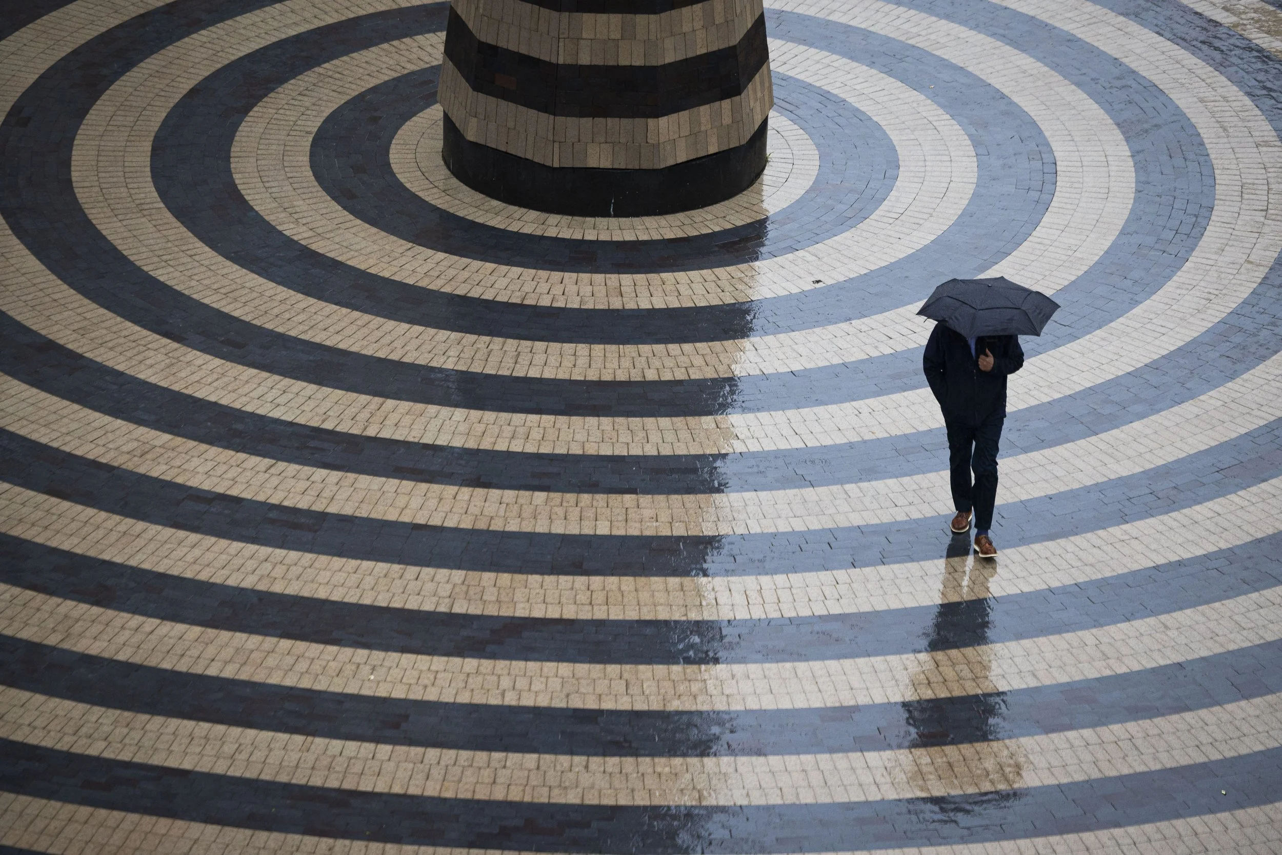  A person uses an umbrella to shield themselves from the rain as they make their way across Tower Square on Tuesday June 5, 2025. Areas of Lincoln generally saw about 0.5 to 0.75 inches of rain Tuesday, according to the National Weather Service. Temp