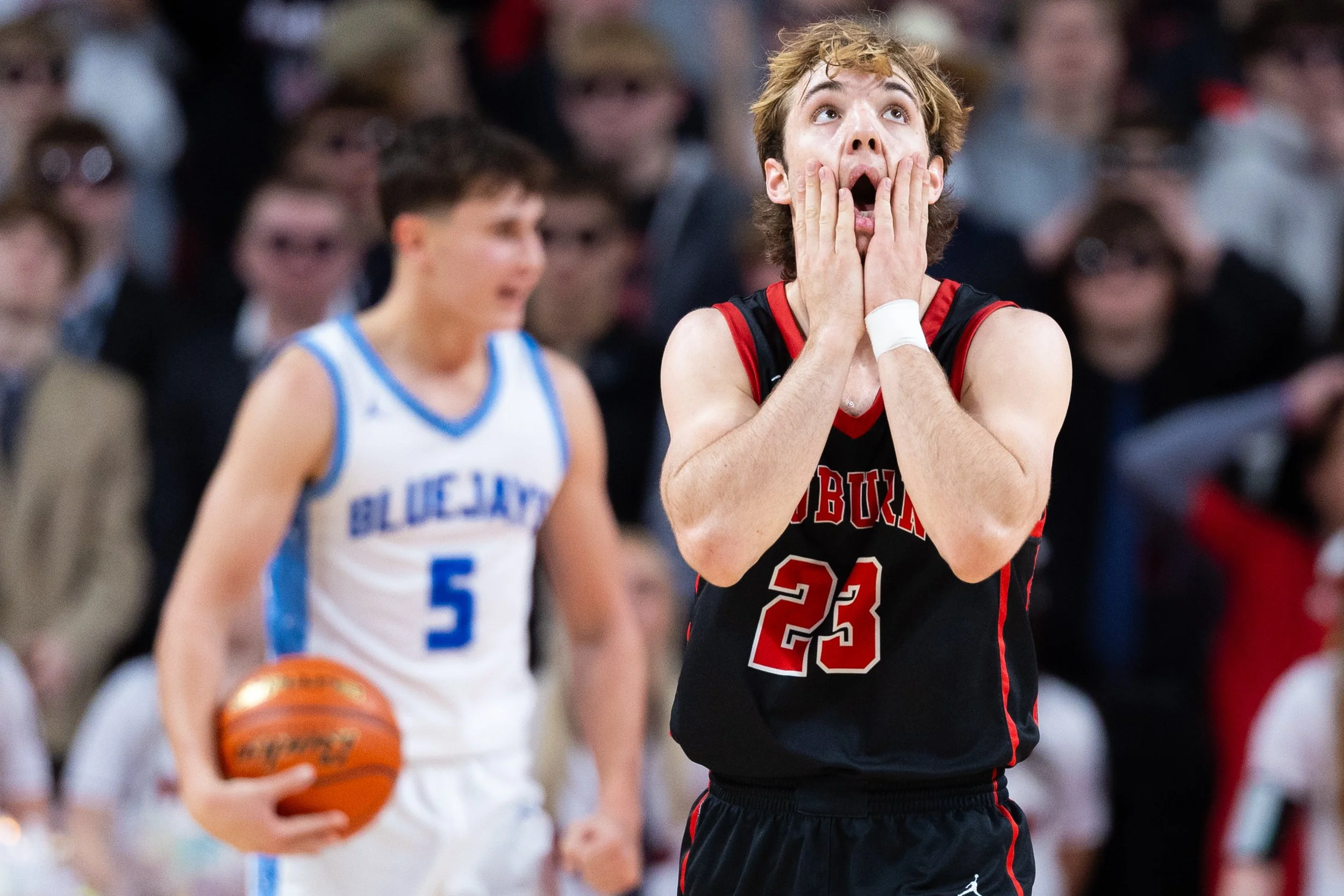 Auburn's Creighton Keeling (23) reacts after being called for fouling Ashland-Greenwood's Cal Kissinger (5) during a Class C-1 semifinal state basketball tournament game on Friday, March 13, 2026, at Pinnacle Bank Arena.