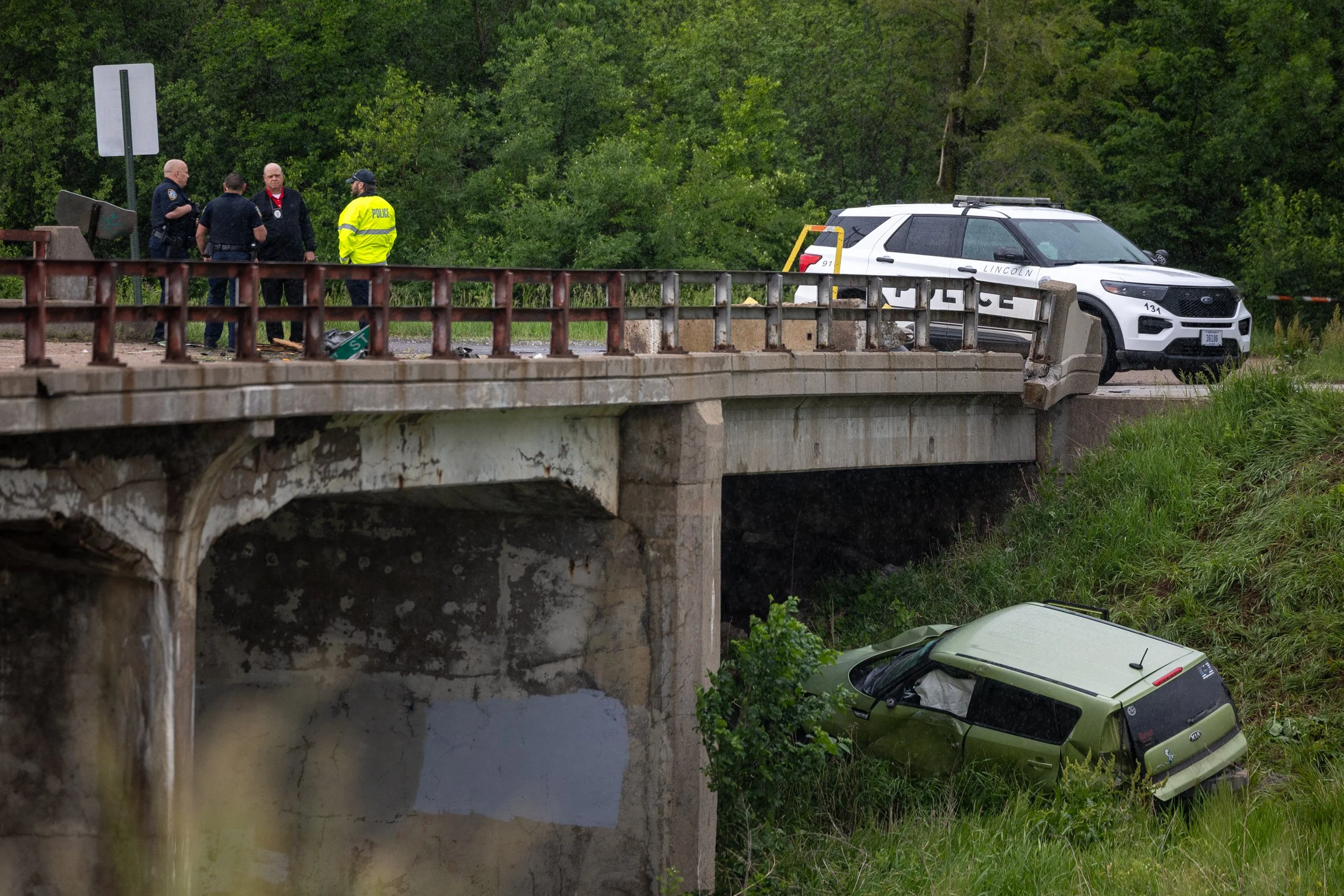 Lincoln Police investigate the scene of a Fatal crash near the Bison Trail Bridge near Park Boulevard and Speedway Circle on Friday, May 22, 2026, in Lincoln. One person died as a result of a single vehicle crash in southwest Lincoln. 