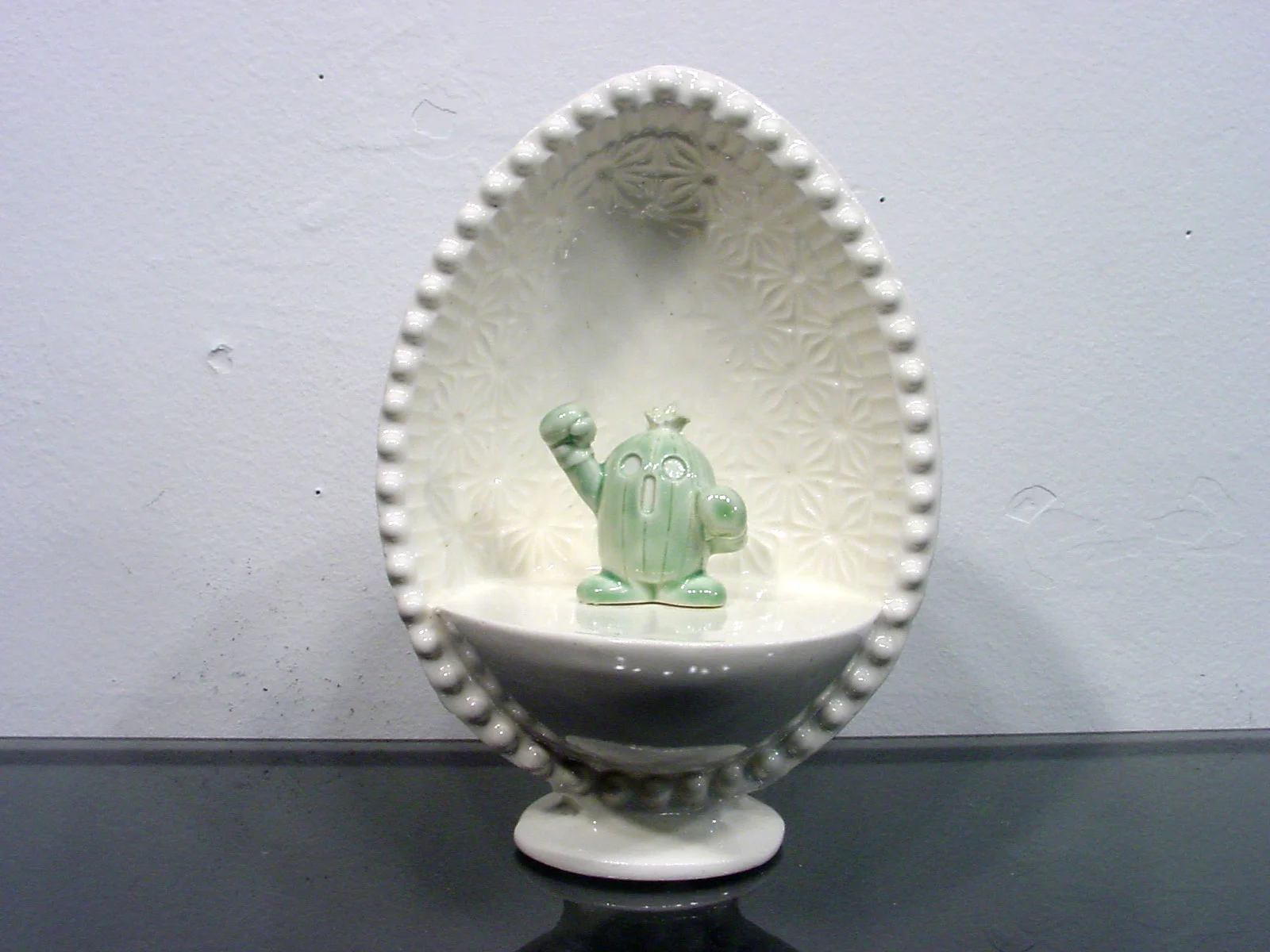 Things Borrowed Without Permission Series, 2 001, slip cast porcelain, glaze, glass shelf.