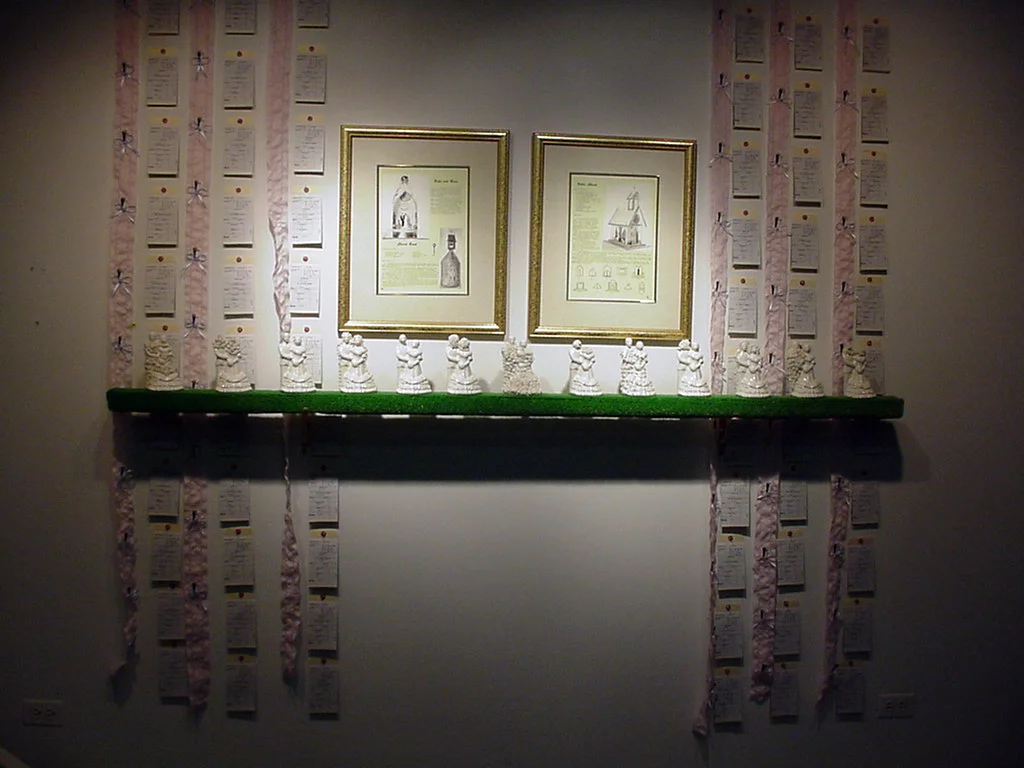 FOR YOU , 2000, slip cast porcelain, glaze, wood, astro-turf, brass shelf mounts, picture frames, printed instructions, inventory cards, ribbon, glass beads, fabric, plastic bride and groom toothpicks, 8’x6”x7’