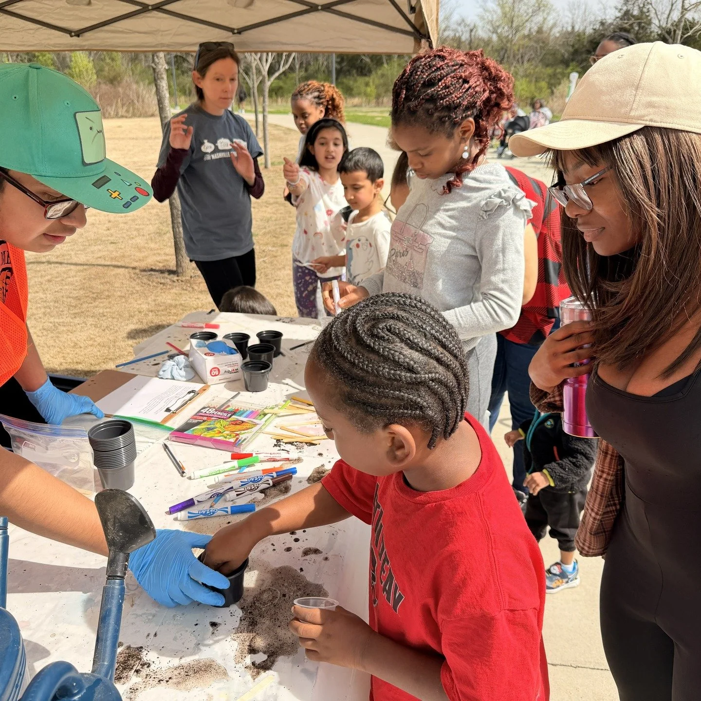 📖✨ This weekend, Mill Ridge Park became a living storybook!

Families wandered a quarter-mile Story Stroll, stopping along the trail as volunteers shared Lola Plants a Garden&mdash;in both English and Spanish&mdash;bringing each page to life in comm