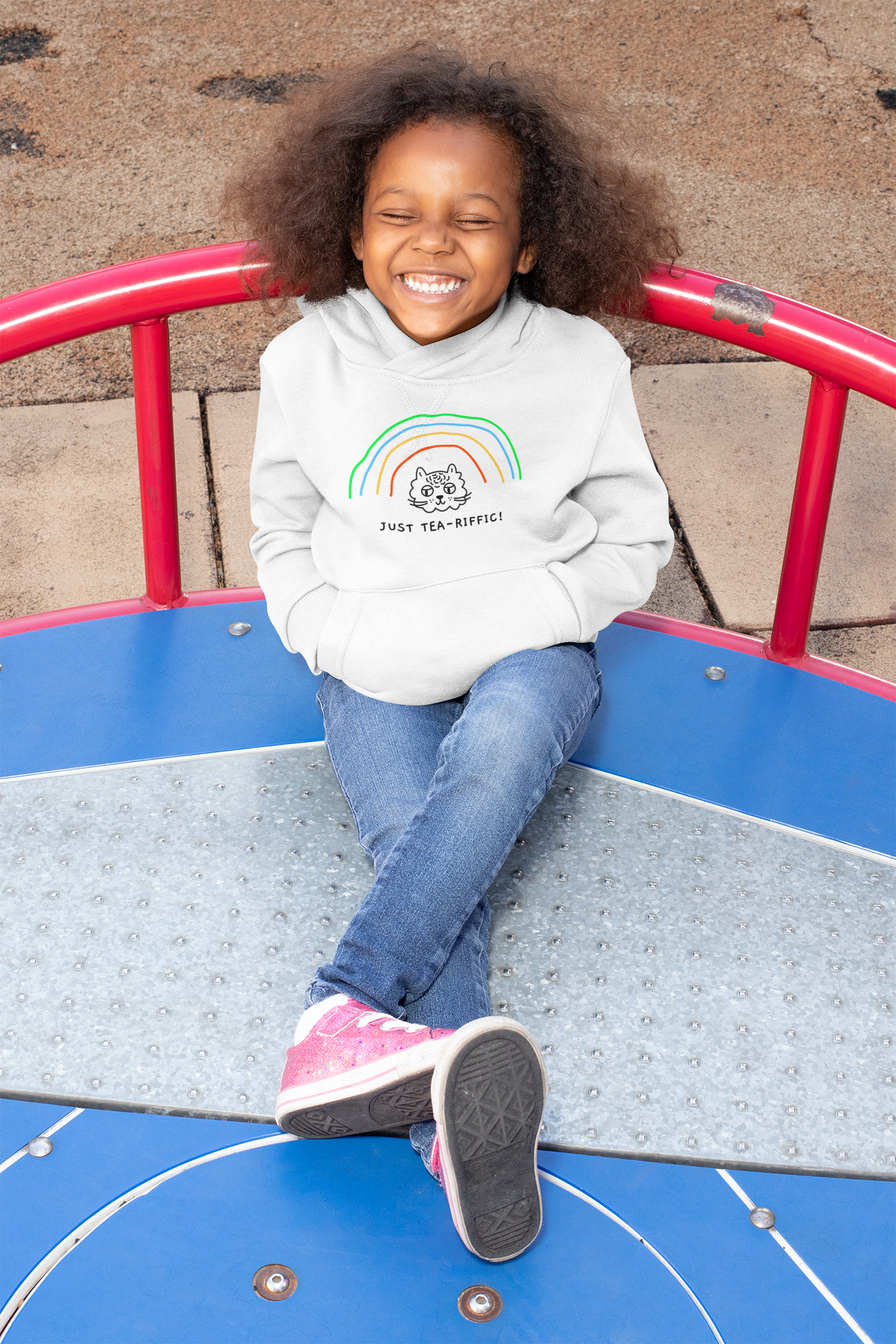 mockup-of-a-happy-girl-wearing-a-hoodie-at-a-playground-32188.png