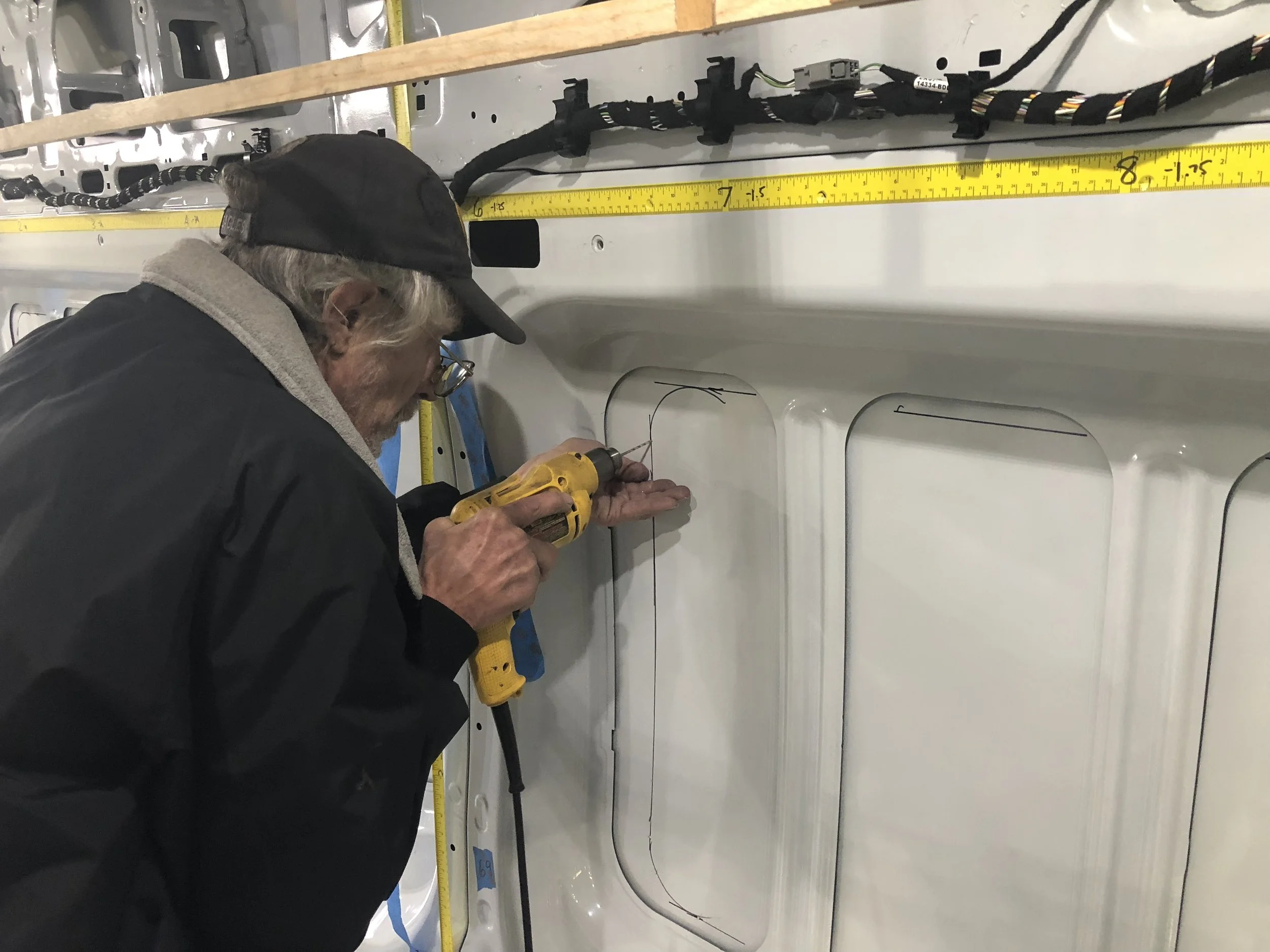 Drill pilot holes to transfer the interior markings to the exterior
