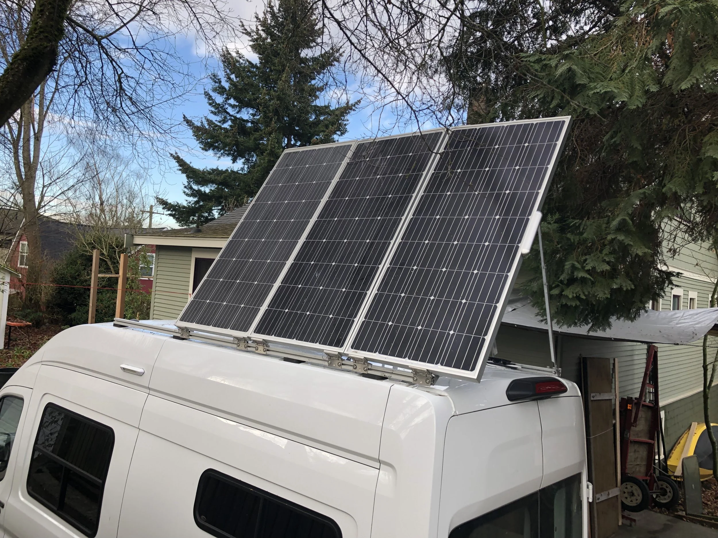 Tilting Solar panel install — Sunlight and trees