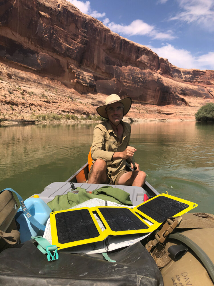 Me in the stern seat, solar panel keeping our gps running