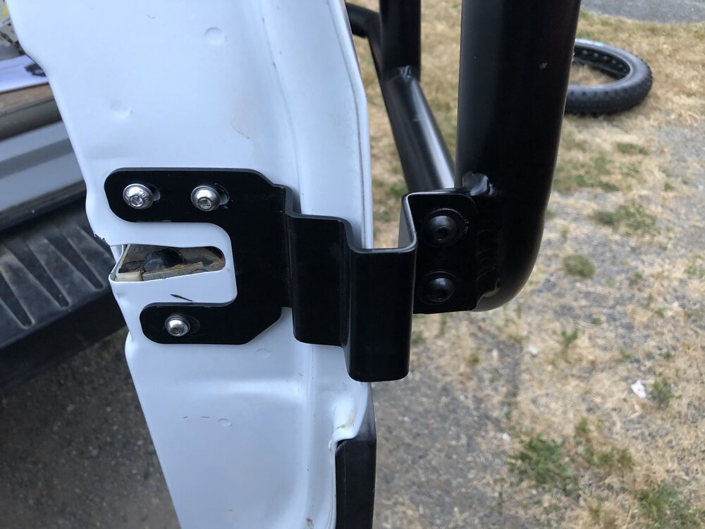 Passenger door latch bracket