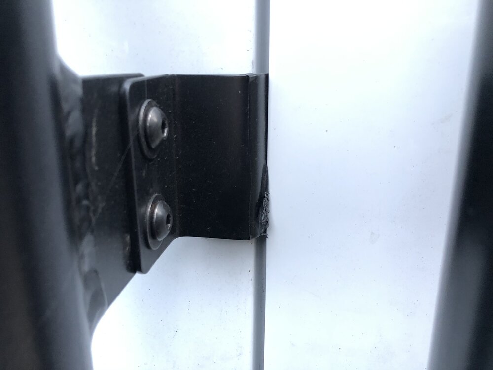 Driver side latch bracket