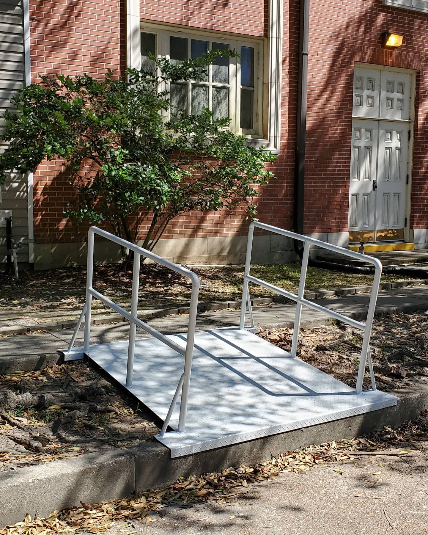 Custom aluminum ramp with a non slip textured powder coated finish