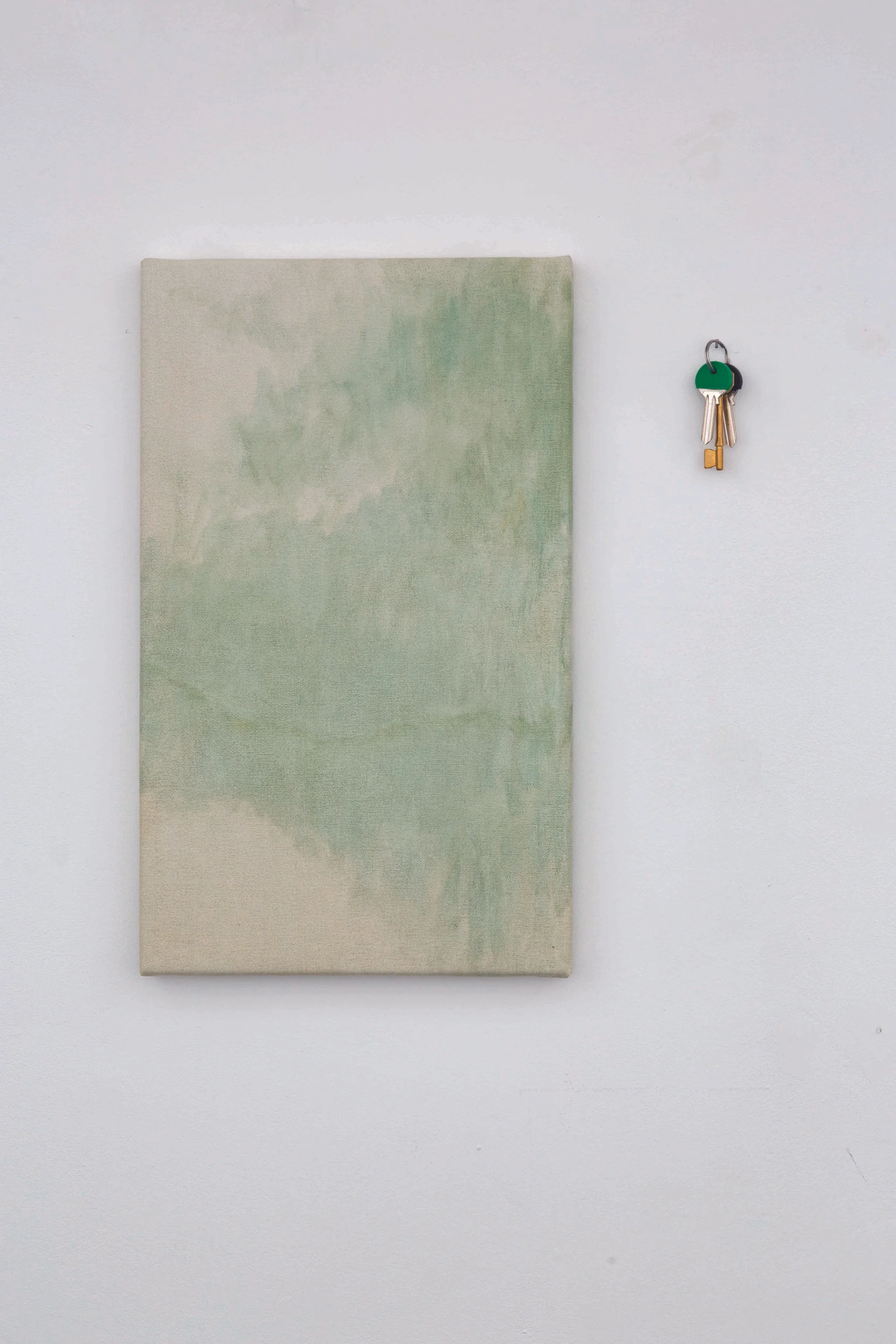 So far 2 parts: key blanks, keyring, key caps, nail; oil on canvas 50 x 50 x 2.5 cm 2018