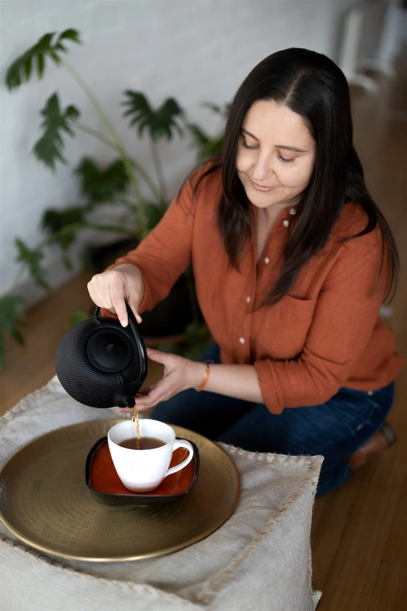 Angi Hills making tea in clinic