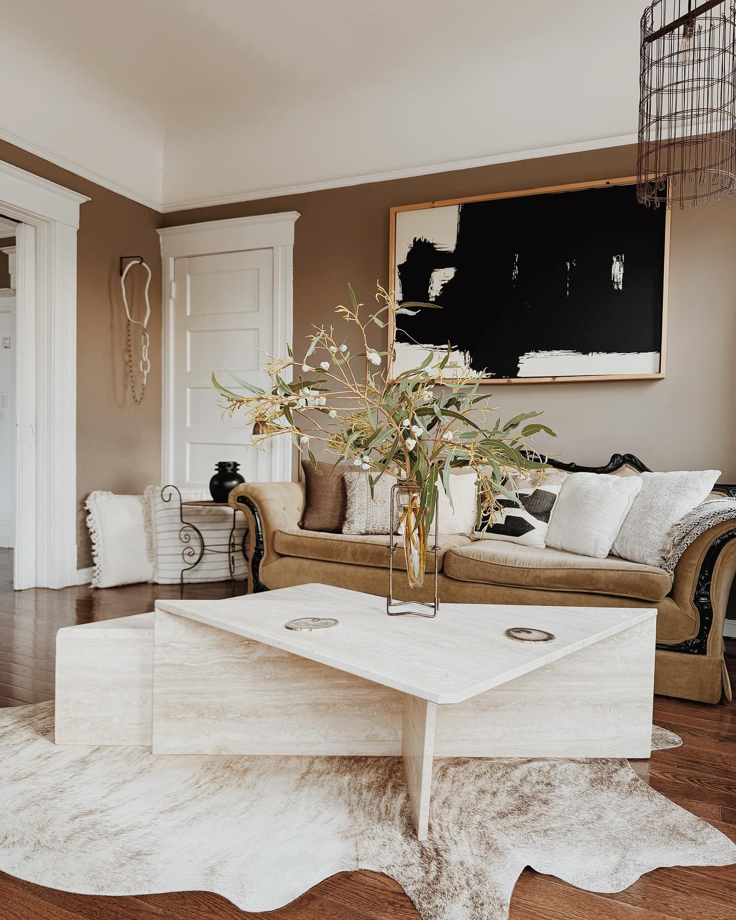 Balanced wabi sabi :: it can be hard to achieve in spaces as most furniture is structured and linear and people follow the walls when arranging rooms. 

A great way to shift that is to start with rugs that aren&rsquo;t square or rectangular but inste