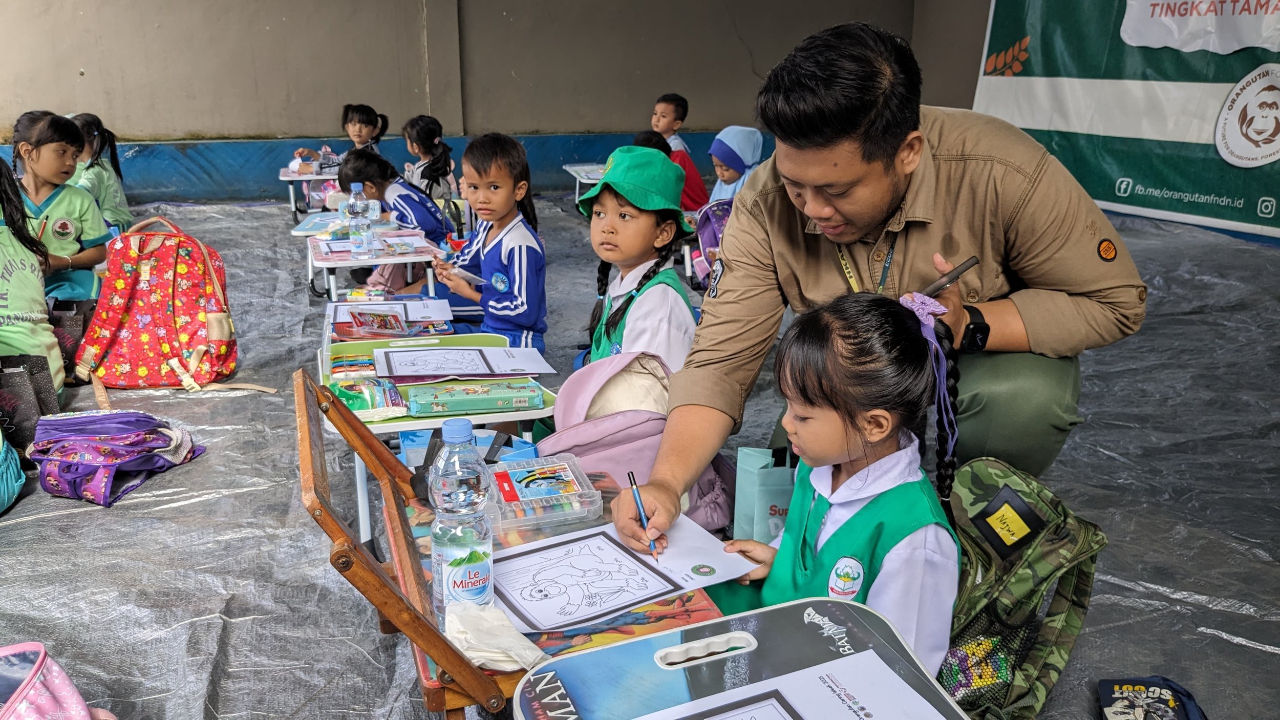 Children colouring orangutans in Orangutan Caring Week.jpeg