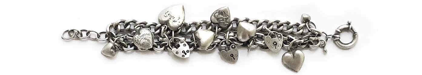 sterling vintage puffy hearts charms bracelet.jpg