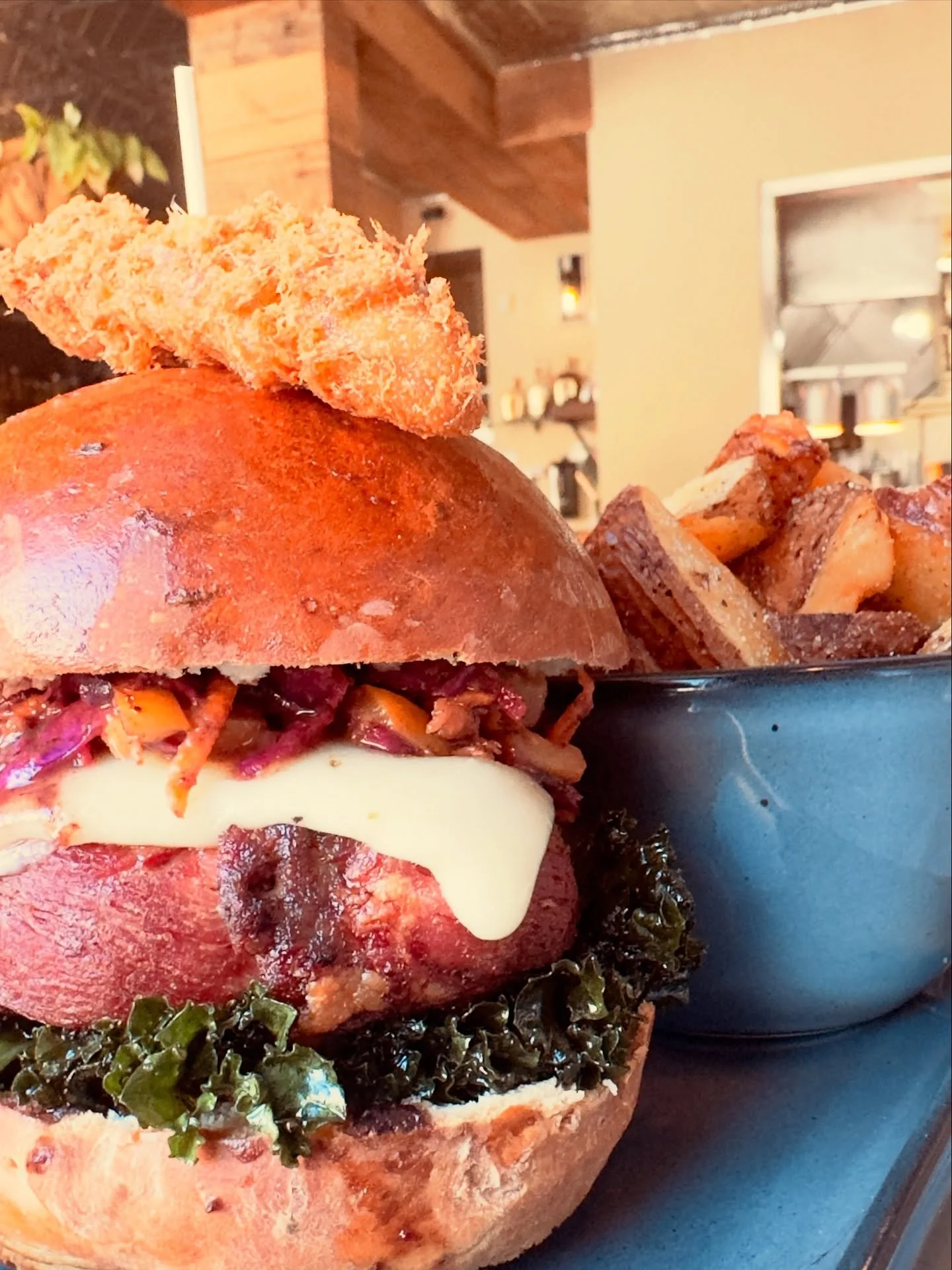 our entry for this years #leburgerweekwinnipeg 

>> the BED'r Burger

duck and elk rouled, patty pan relish, crispy kale on a squash&amp;sage sweet roll topped with a fried dill pickle on duck fat

chef @dseminarioechegoyen 

#leburgerweekwinni