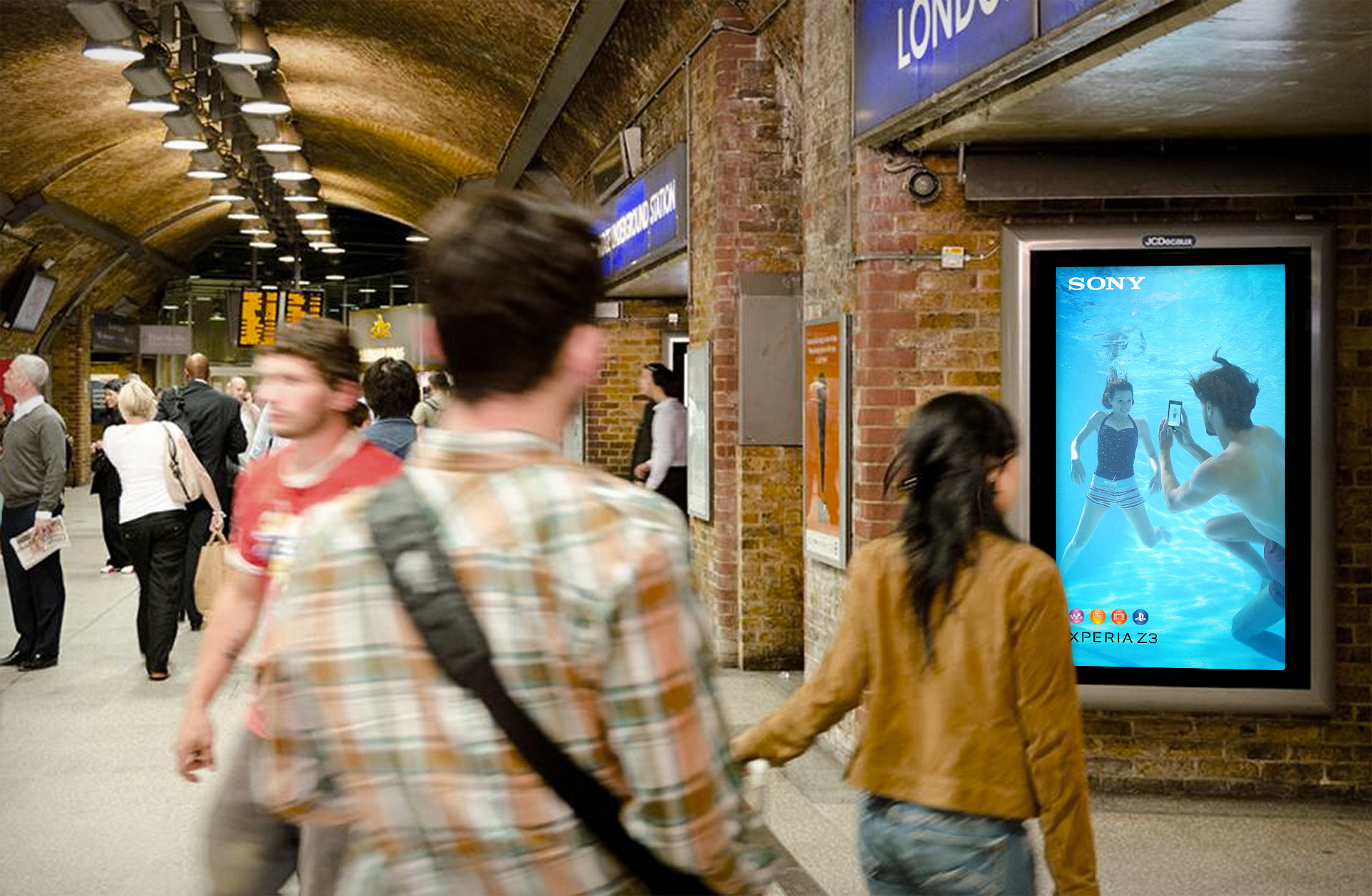 Interactive DOOH: Say cheese! We used the camera built into the ad display unit to take an 'underwater' pic in real-time and show it to the viewer.