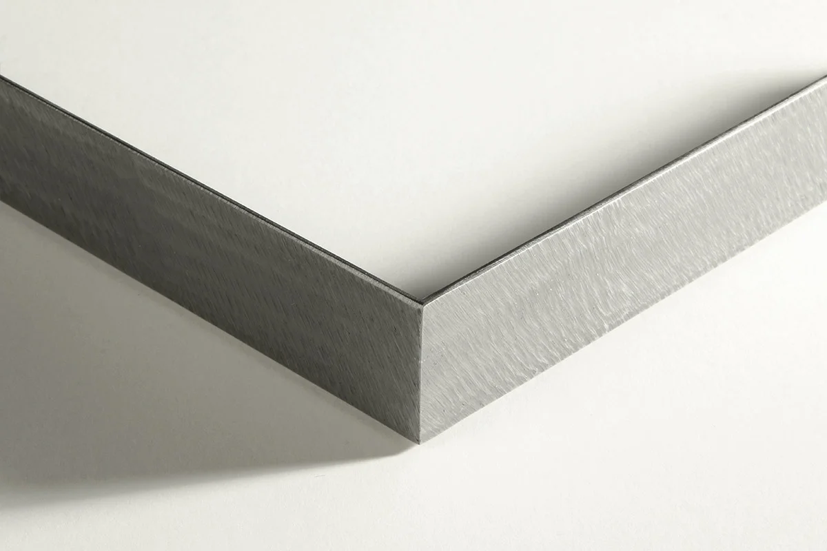 Detail of a floater frame with burnished satin polished edge