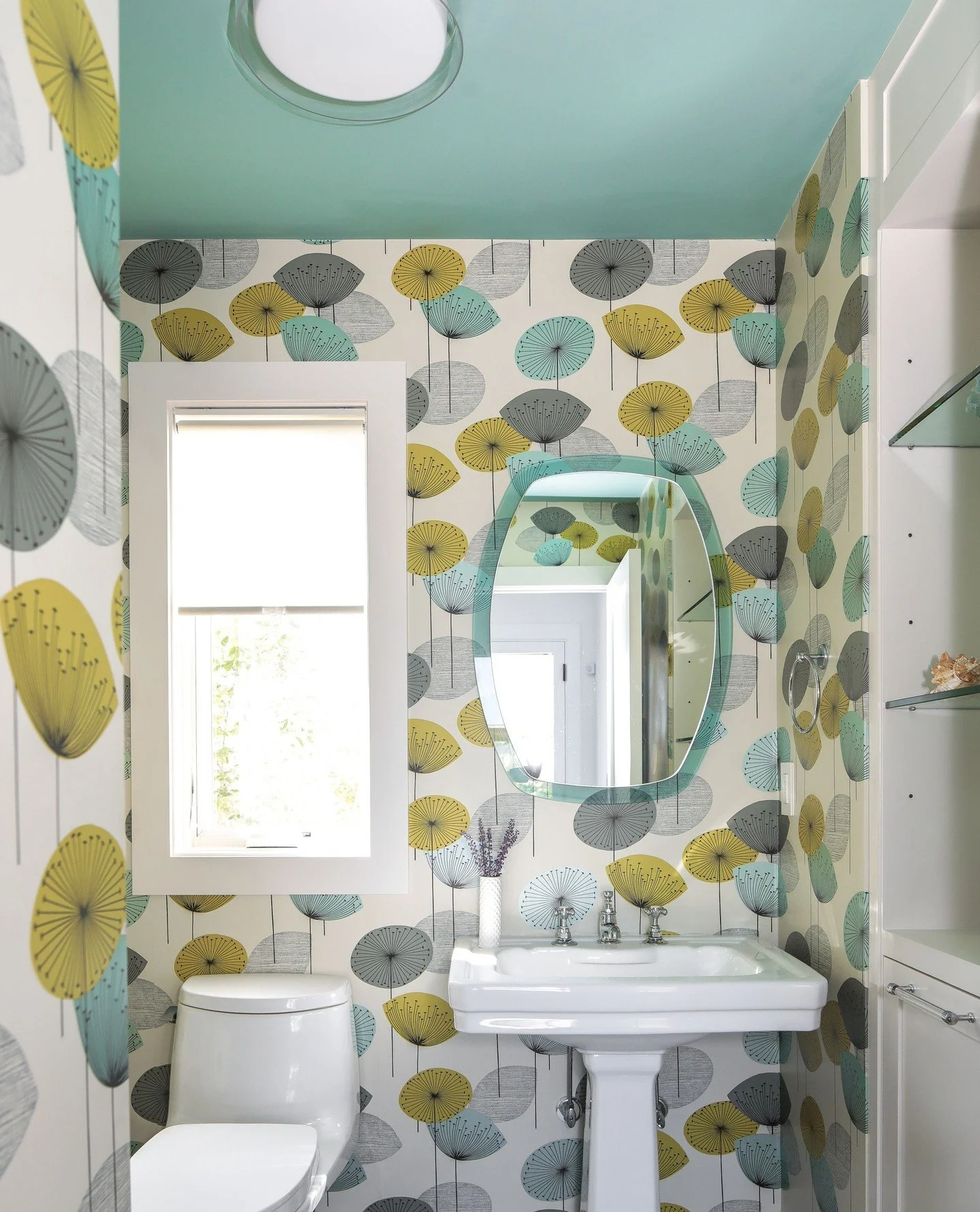 Bold wallpaper, bright vibes! ✨🚽🌿 We painted this bathrooms ceiling to match, and included the perfect mirror to tie it all together! 💛💚✨ #BathroomGoals #WallpaperMagic #CeilingStyle