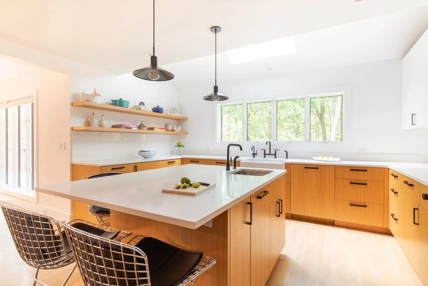 This kitchen remodel showcases custom cabinetry by LMS Design and Furia &amp; Sons, Caesarstone countertops, and SubZero/Wolf appliances &mdash; every detail chosen for function and elegance.